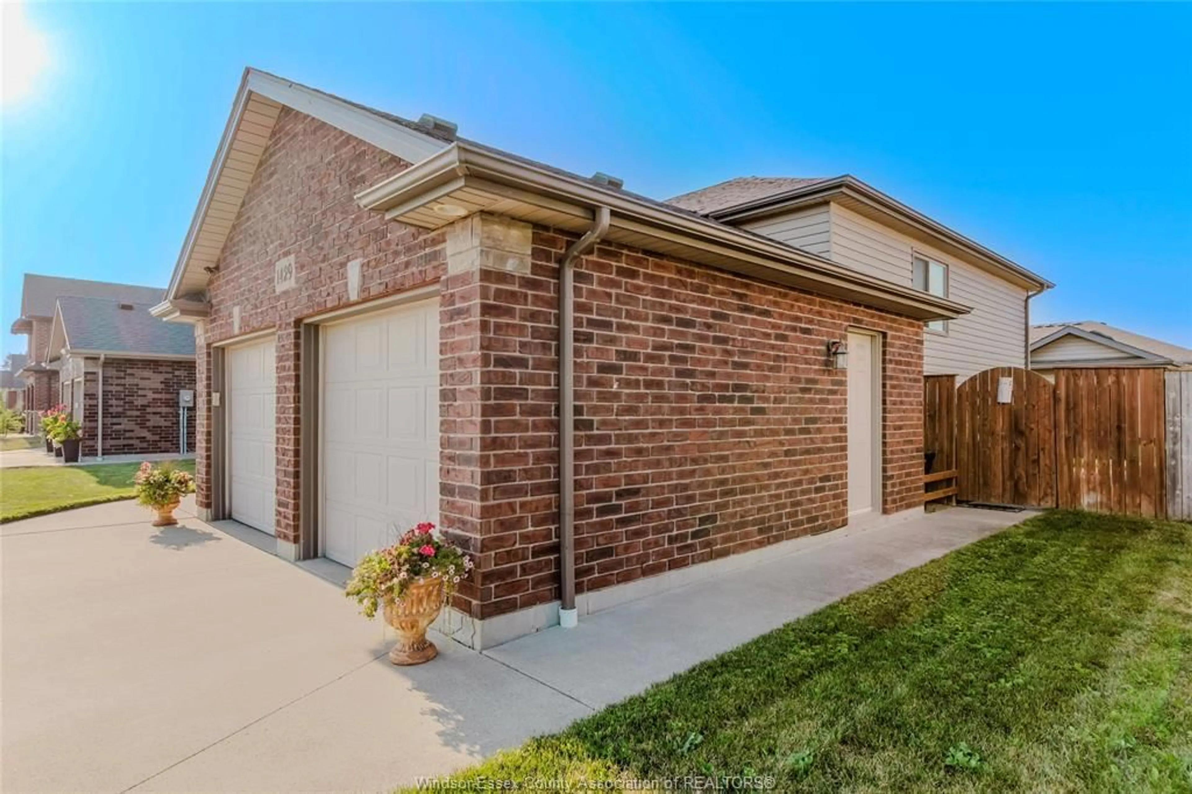 Home with brick exterior material, street for 1429 OAKWOOD Ave, Lakeshore Ontario N8L 0S4