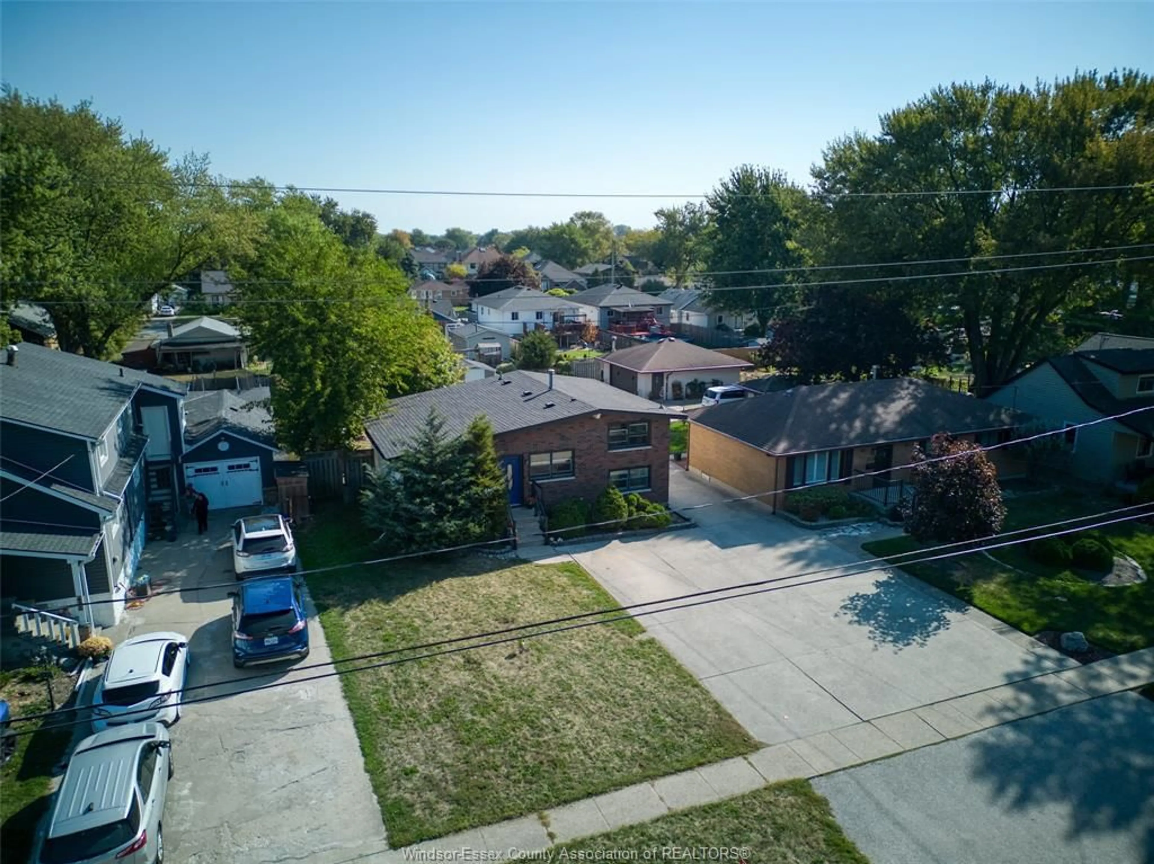 A pic from outside/outdoor area/front of a property/back of a property/a pic from drone, street for 426 LESPERANCE Rd, Tecumseh Ontario N8N 1W4