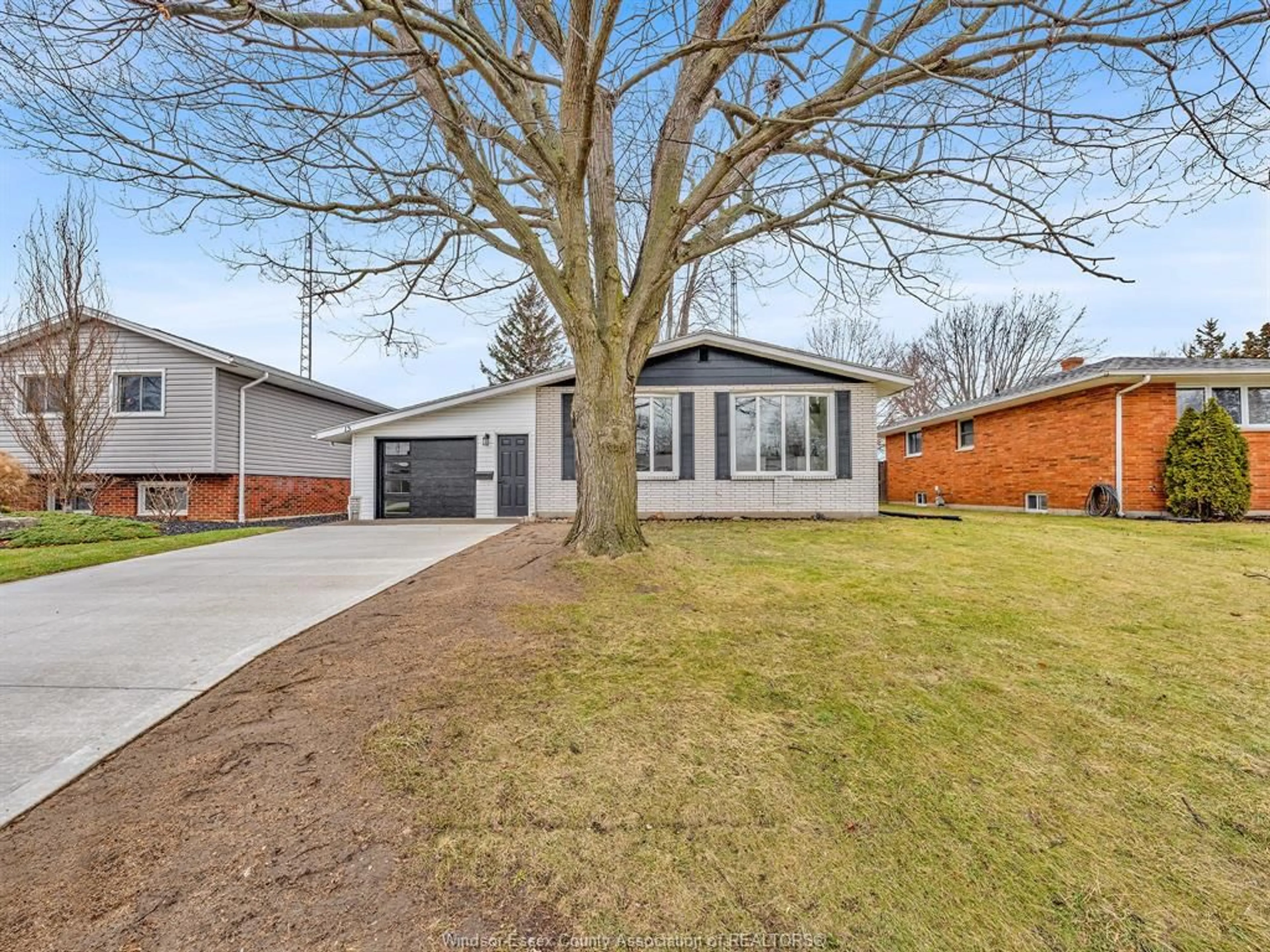 Home with brick exterior material, street for 15 Longfield Lane, Leamington Ontario N8H 2R2