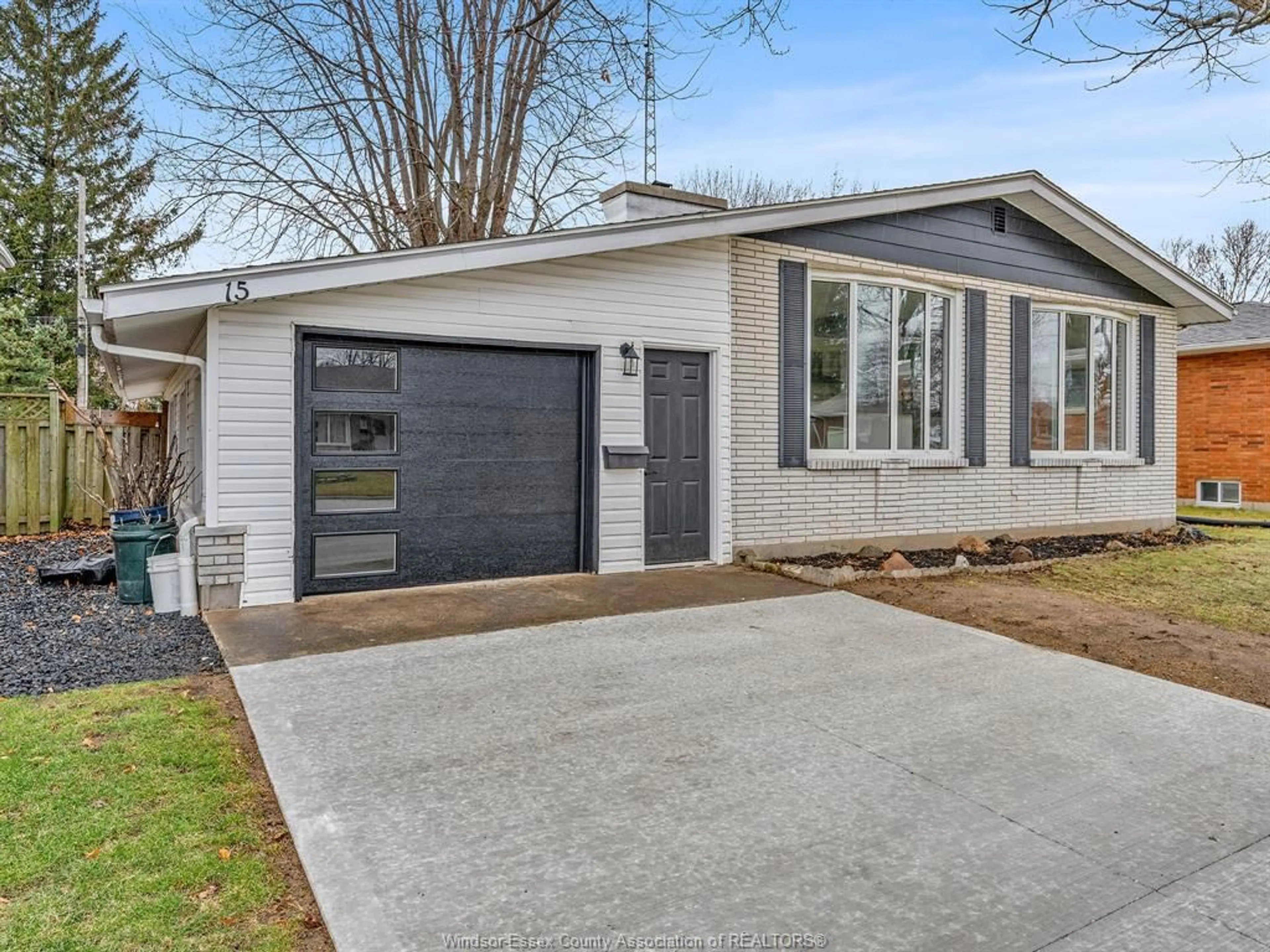 Home with vinyl exterior material, street for 15 Longfield Lane, Leamington Ontario N8H 2R2