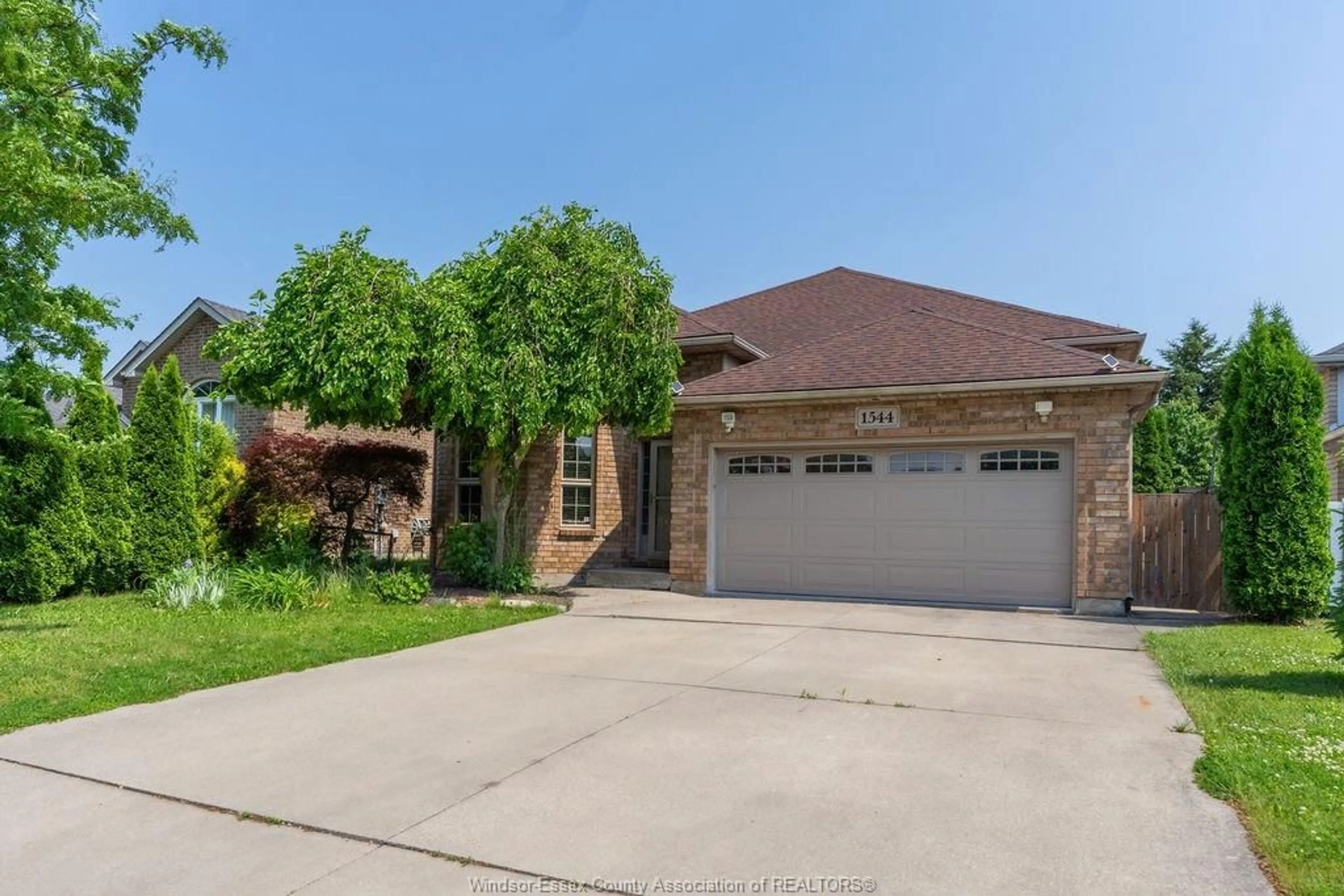 Home with brick exterior material, street for 1544 IMPERIAL Cres, Windsor Ontario N9G 2T8