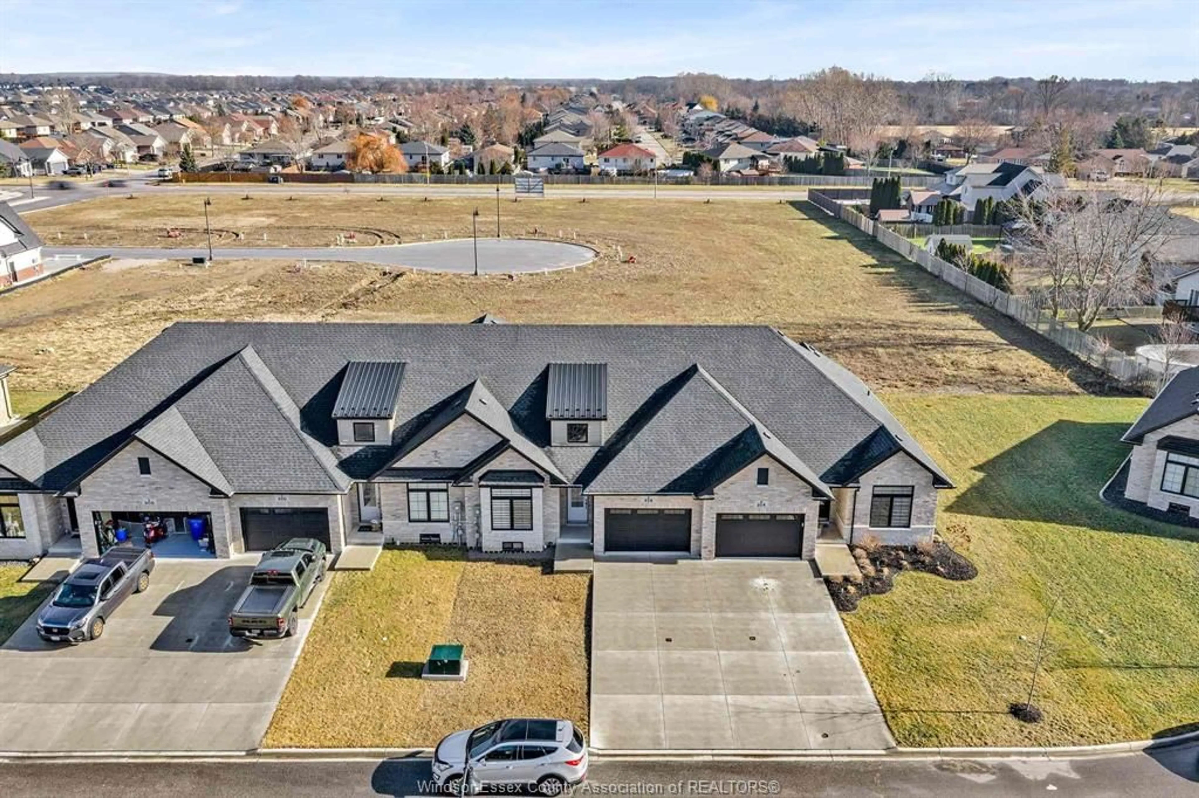 A pic from outside/outdoor area/front of a property/back of a property/a pic from drone, street for 214 Livingstone Cres, Amherstburg Ontario N9V 0H1