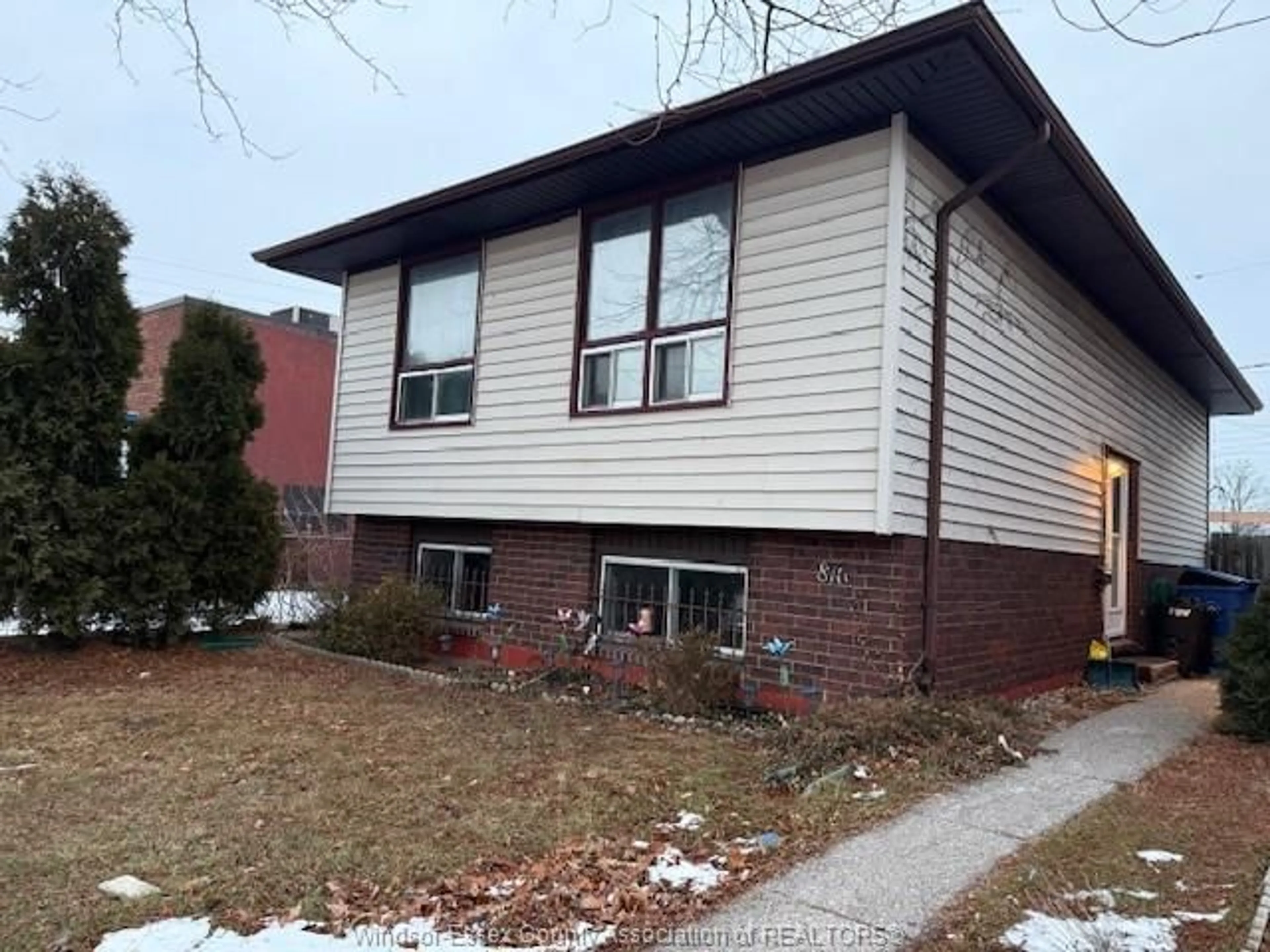Home with brick exterior material, street for 816 DAWSON Rd, Windsor Ontario N8Y 4A2