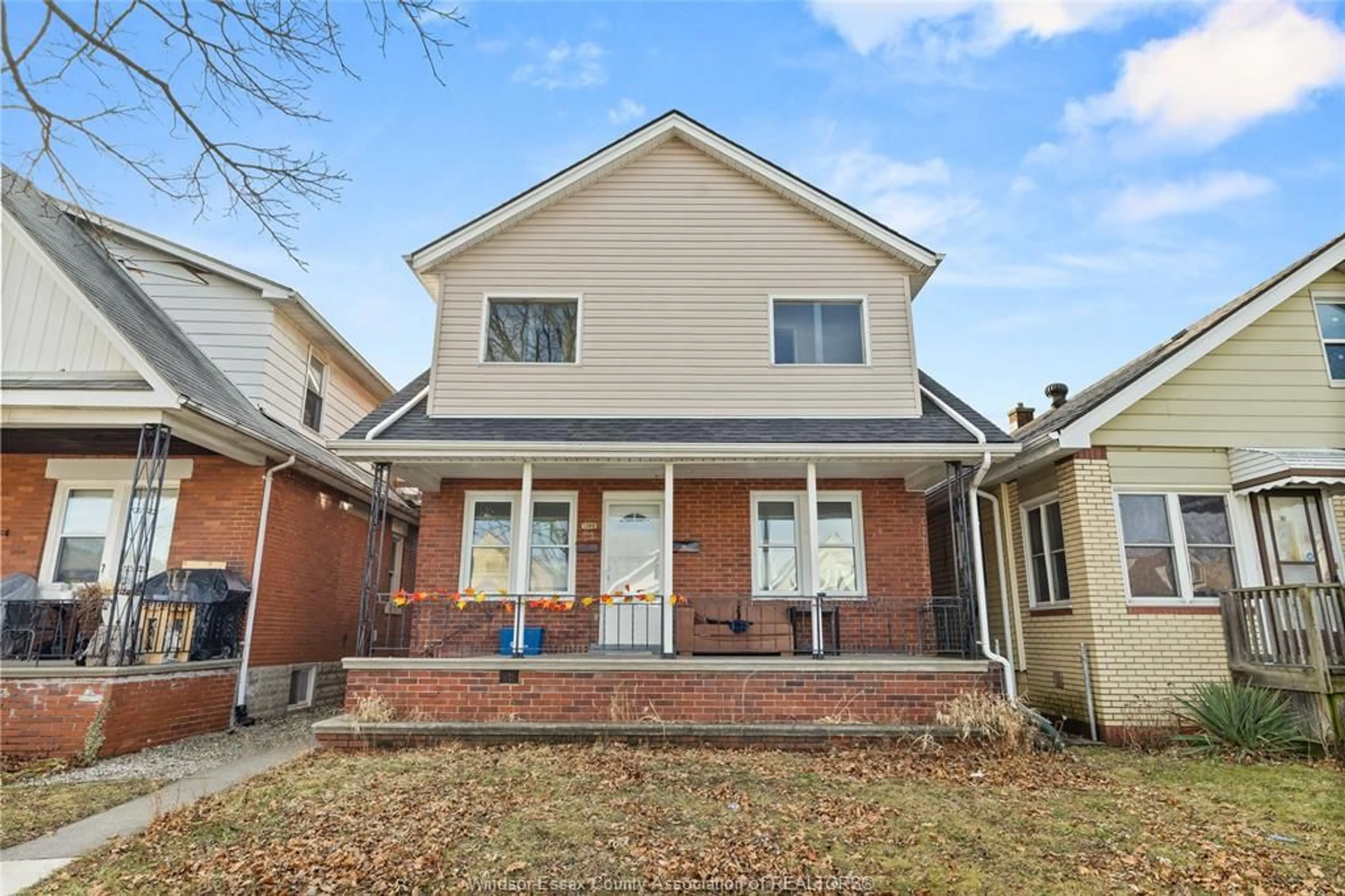 Home with brick exterior material, street for 1389 LANGLOIS Ave, Windsor Ontario N8X 4L8