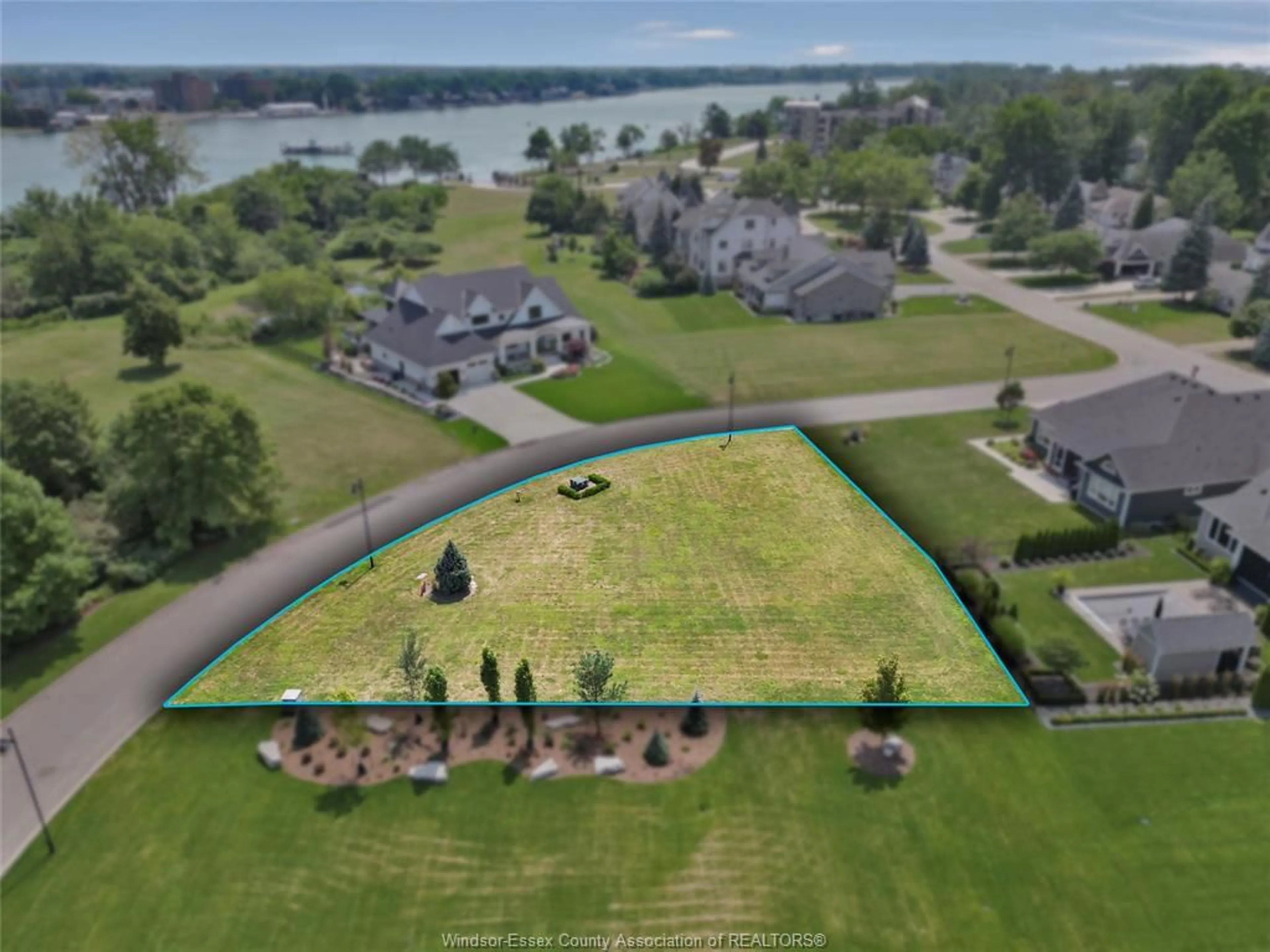 A pic from outside/outdoor area/front of a property/back of a property/a pic from drone, water/lake/river/ocean view for 104 RIVERWALK Cres, Amherstburg Ontario N9V 4C4