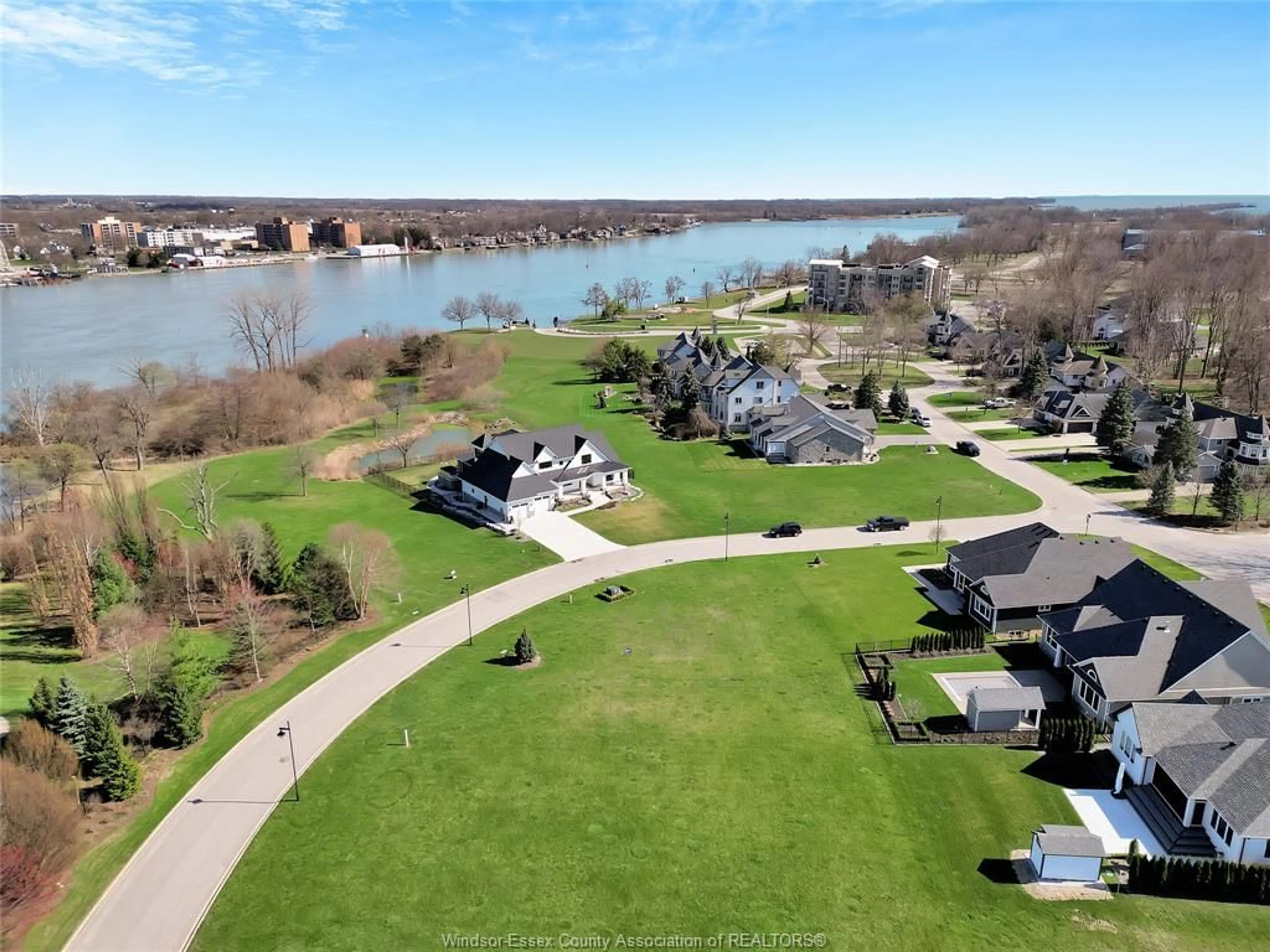 A pic from outside/outdoor area/front of a property/back of a property/a pic from drone, water/lake/river/ocean view for 104 RIVERWALK Cres, Amherstburg Ontario N9V 4C4