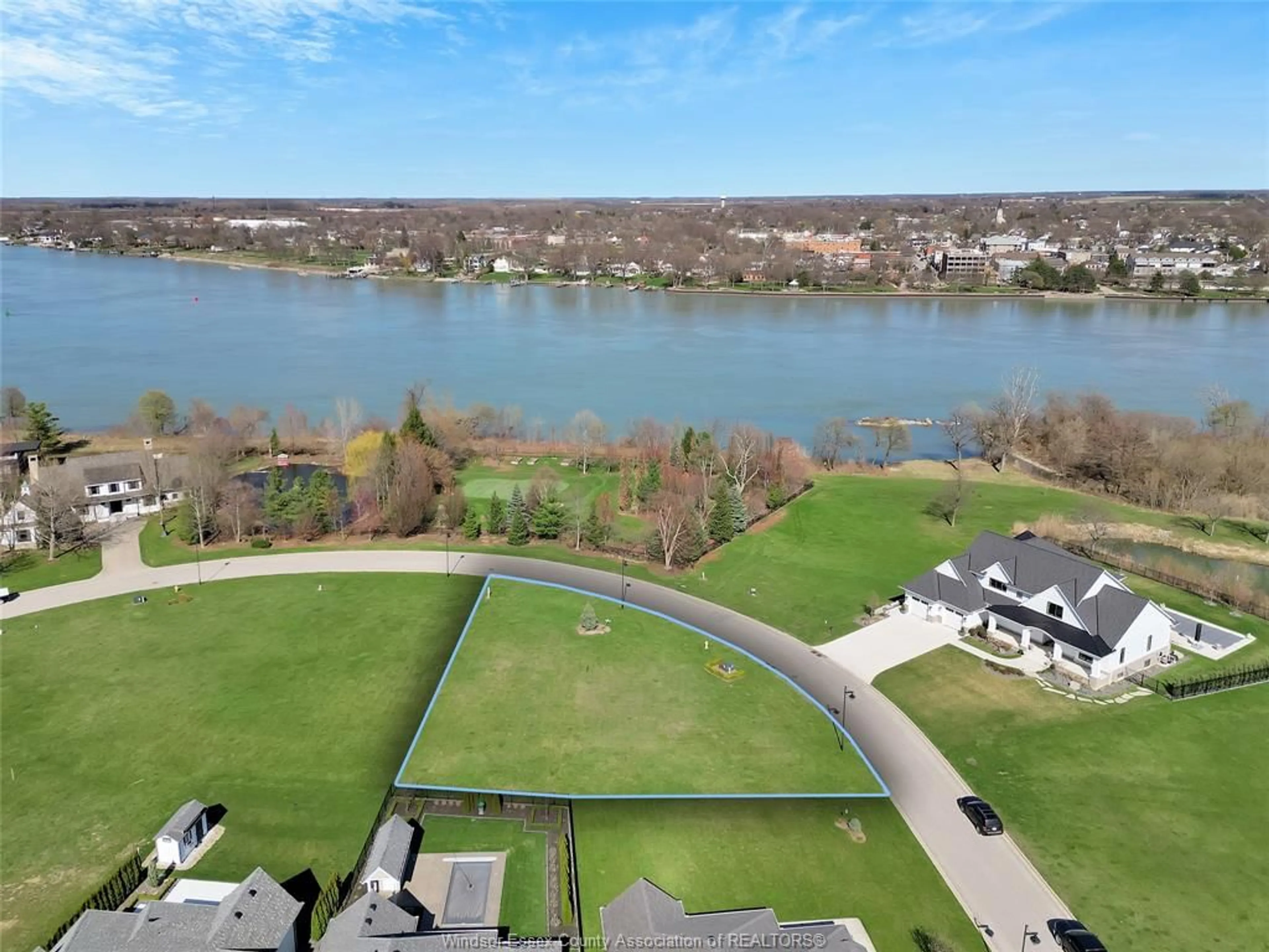 A pic from outside/outdoor area/front of a property/back of a property/a pic from drone, water/lake/river/ocean view for 104 RIVERWALK Cres, Amherstburg Ontario N9V 4C4
