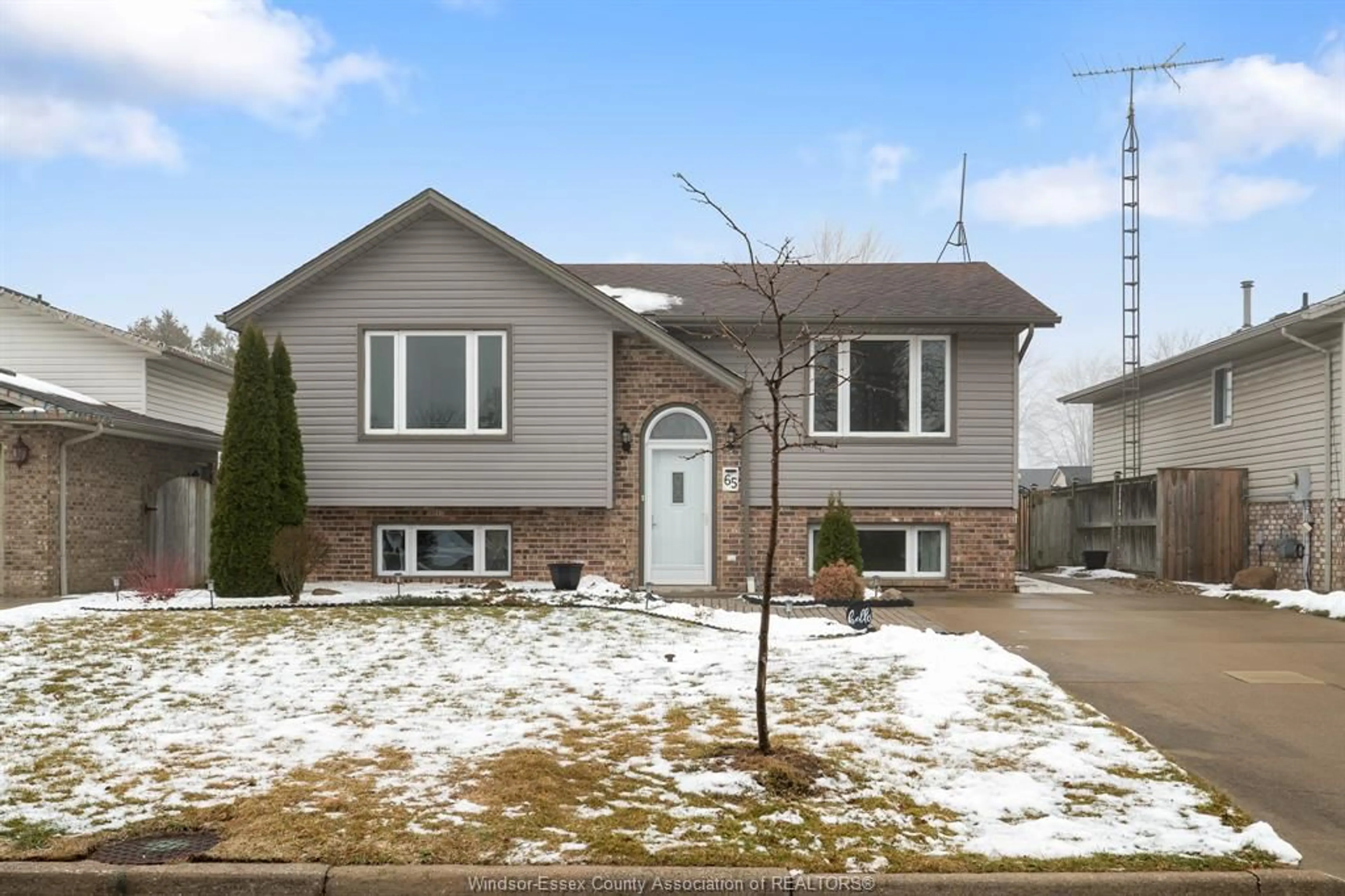 Home with vinyl exterior material, street for 65 Mediterranean Ave, Amherstburg Ontario N9V 3X6