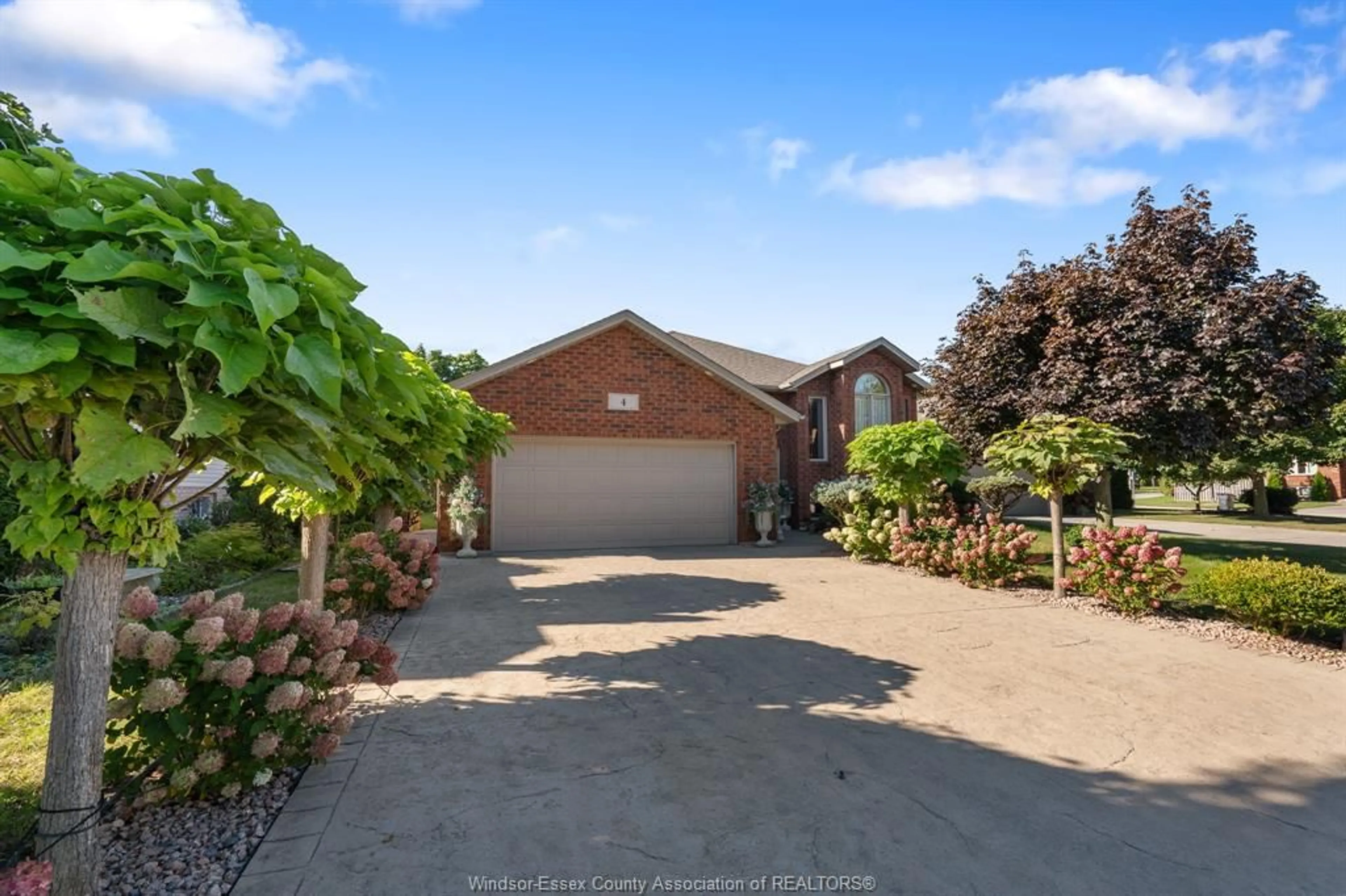 A pic from outside/outdoor area/front of a property/back of a property/a pic from drone, street for 4 Francesco Crt, Leamington Ontario N8H 5M4