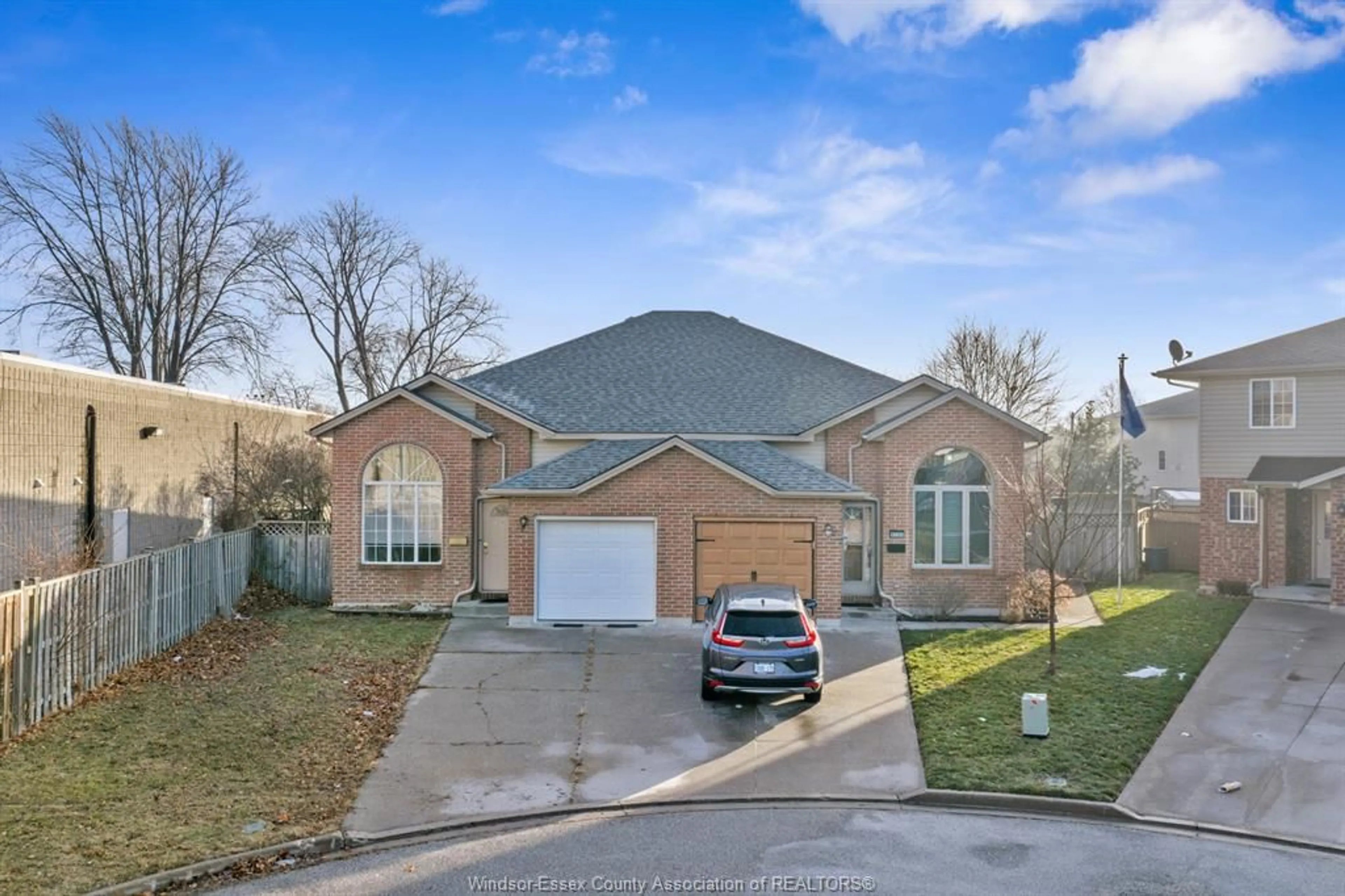 Home with brick exterior material, street for 9759 MELVILLE Dr, Windsor Ontario N8R 1B4