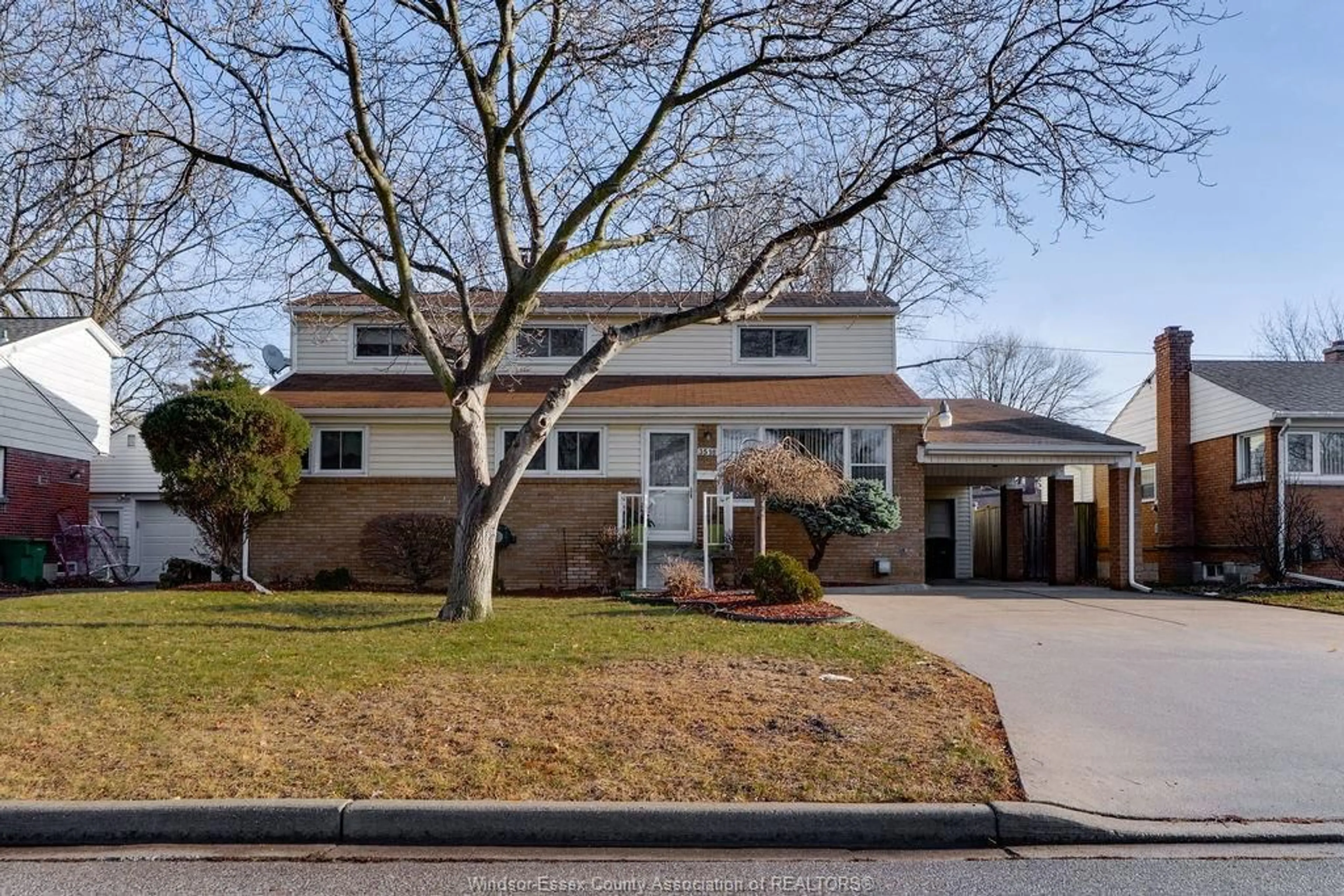 Home with vinyl exterior material, street for 3518 WOODLAND Ave, Windsor Ontario N9E 1Z8