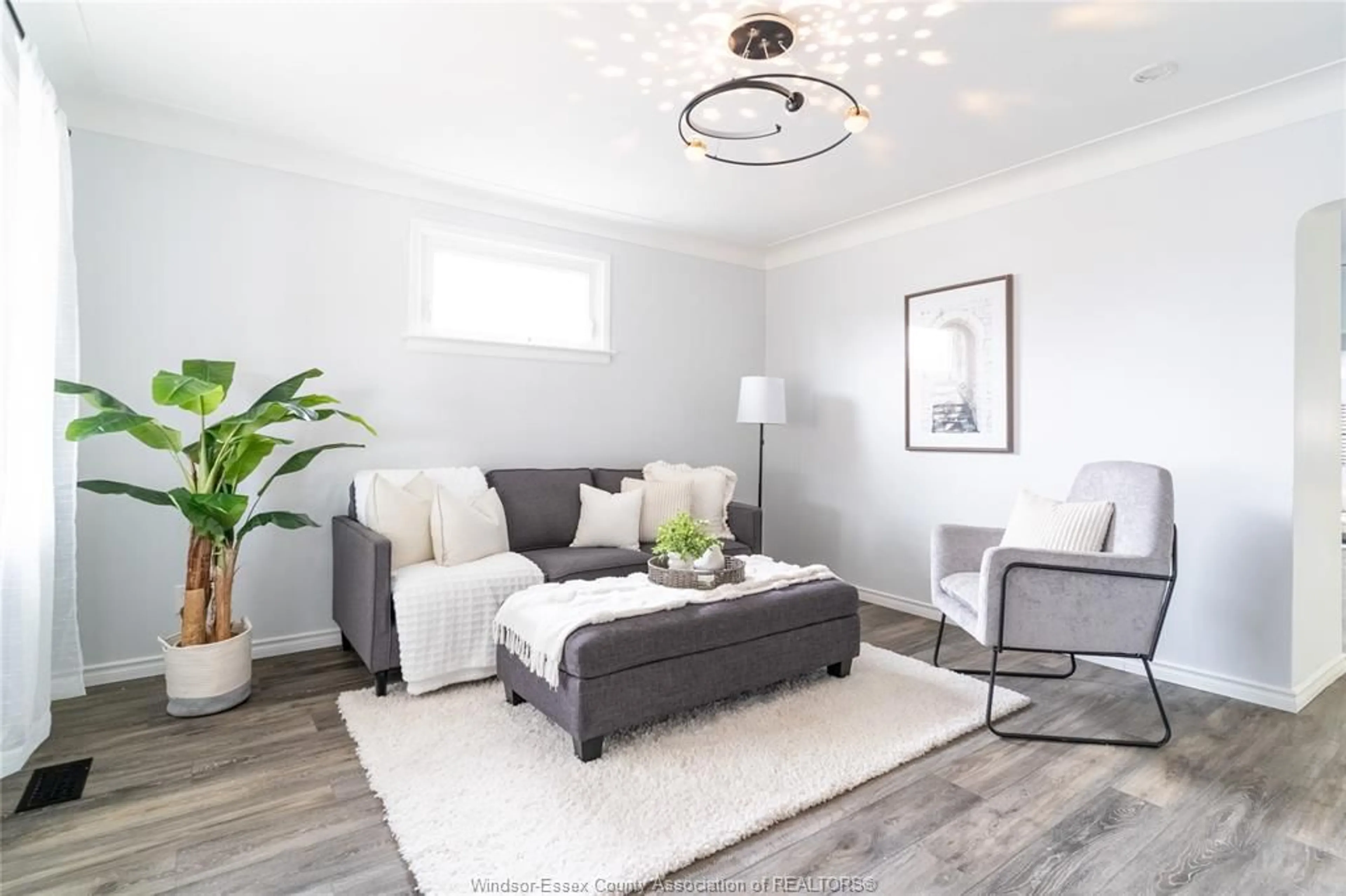 Living room with furniture, wood/laminate floor for 2571 MEIGHEN, Windsor Ontario N8W 4C3