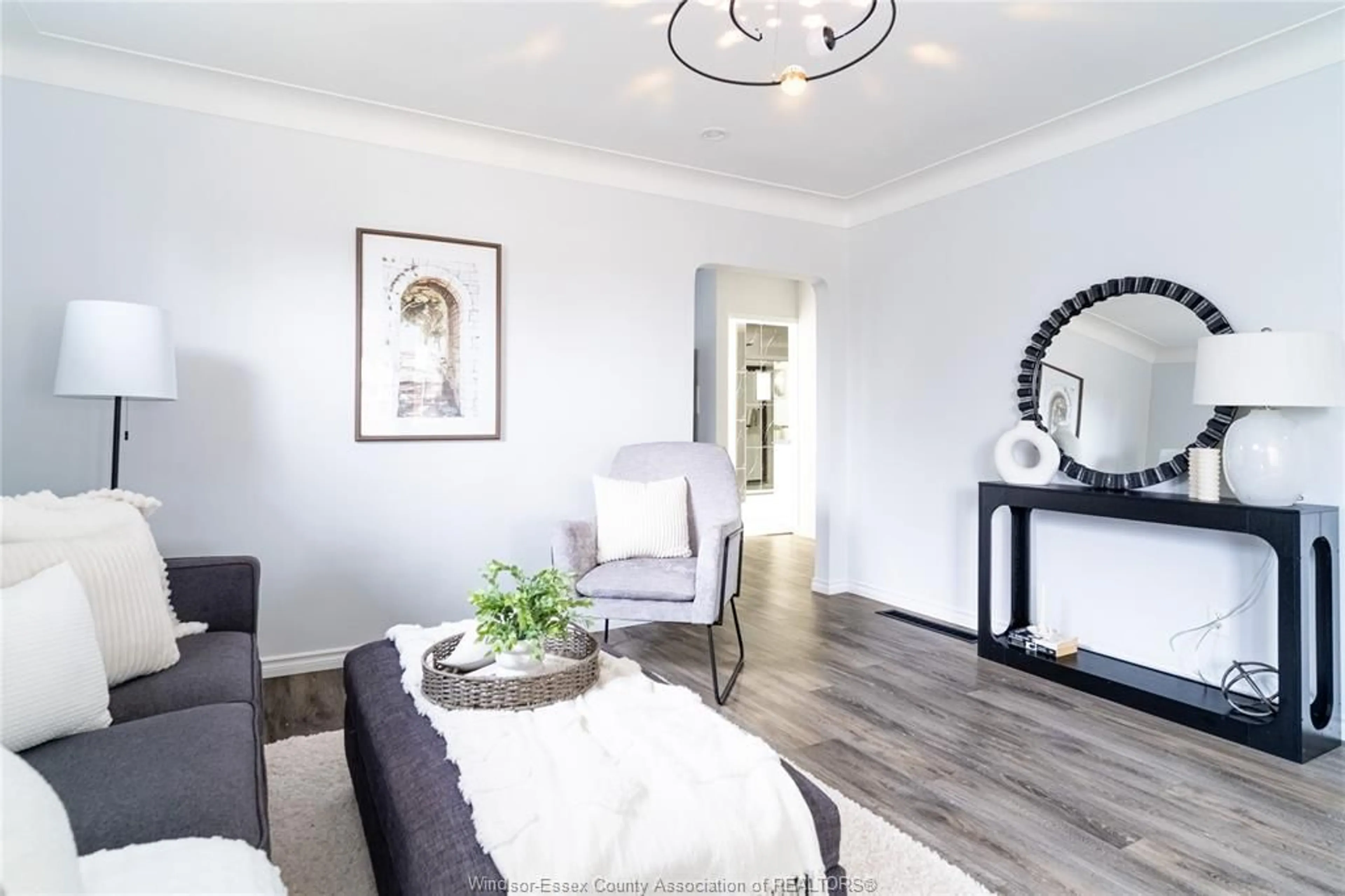 Living room with furniture, wood/laminate floor for 2571 MEIGHEN, Windsor Ontario N8W 4C3