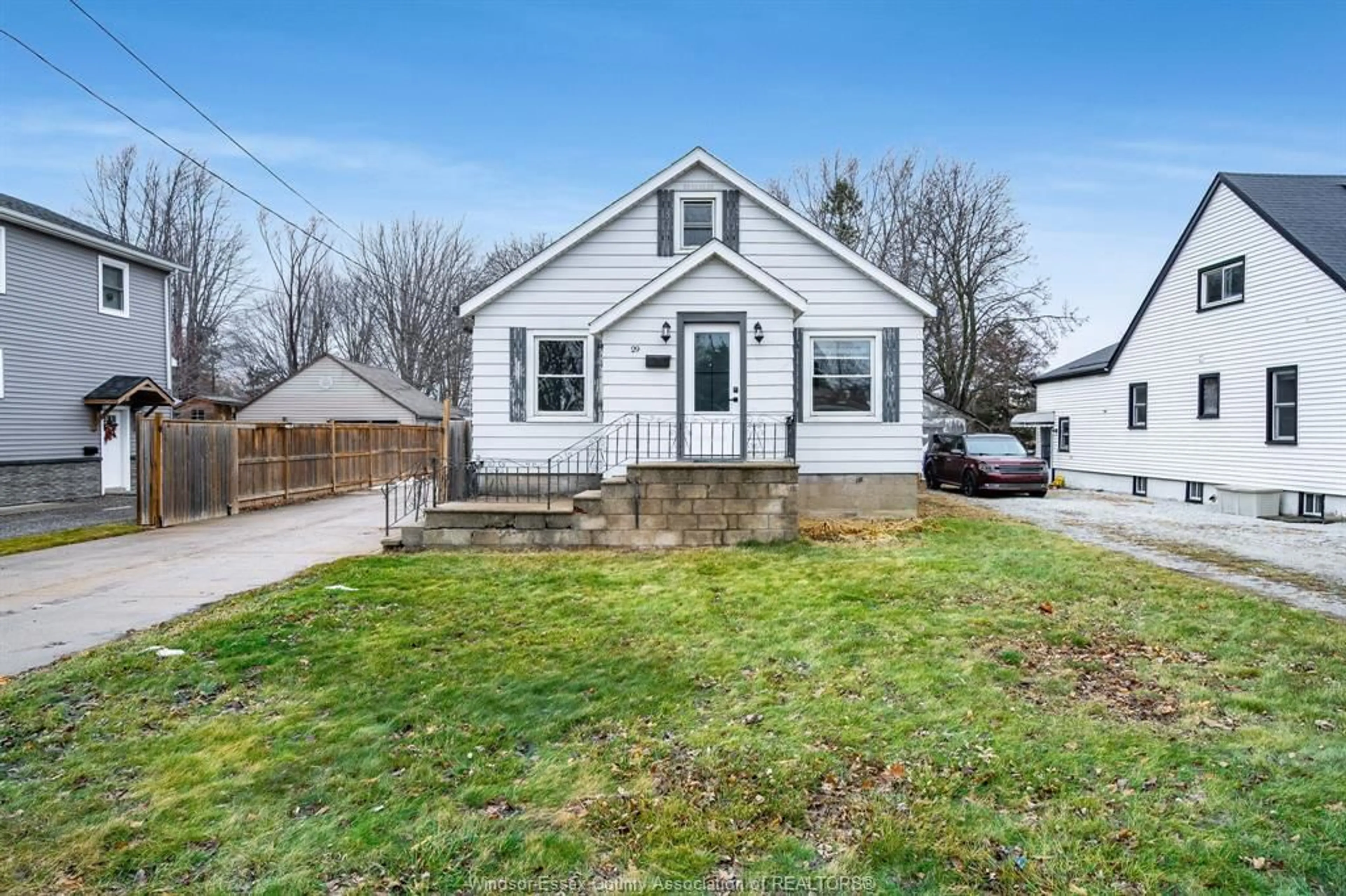 Home with vinyl exterior material, street for 29 WILKINSON Dr, Leamington Ontario N8N 1A1