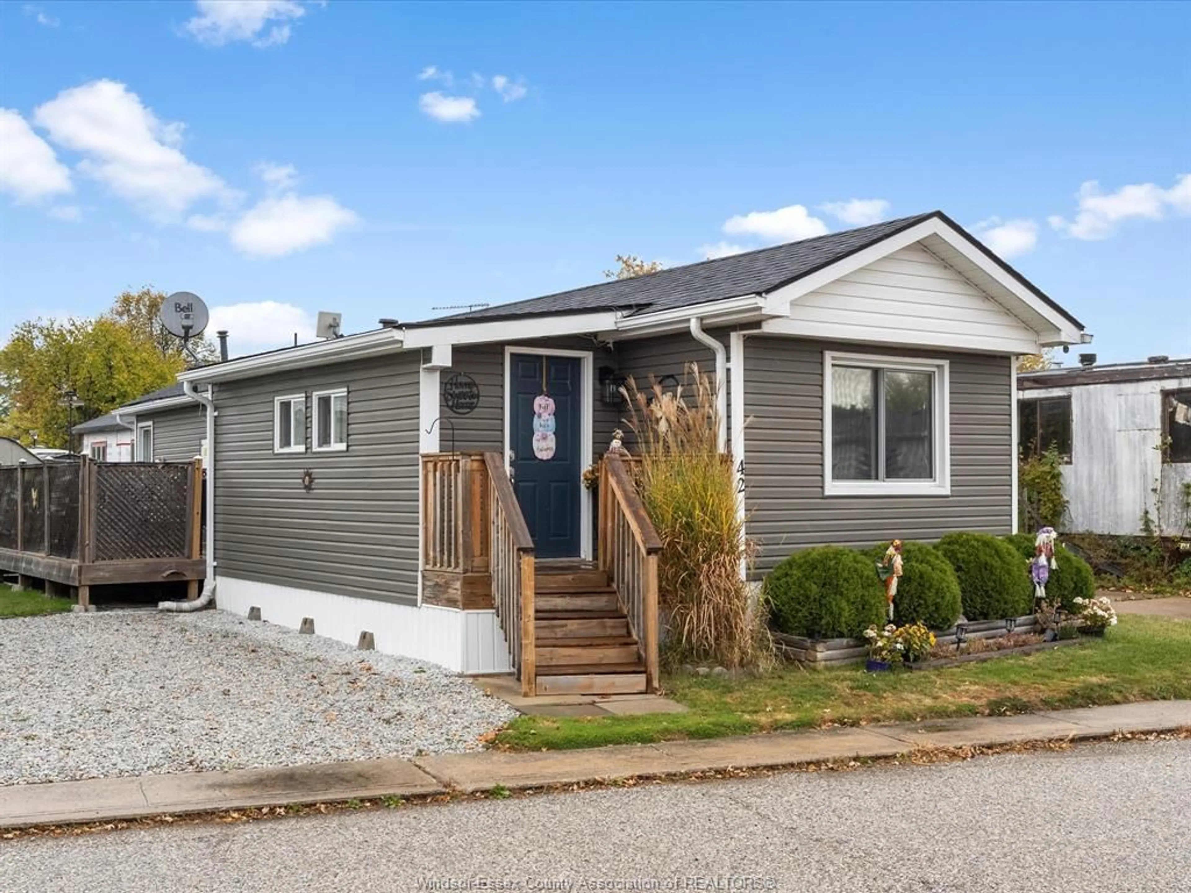 Home with vinyl exterior material, street for 42 WILDER Dr, Lakeshore Ontario N8N 2S2