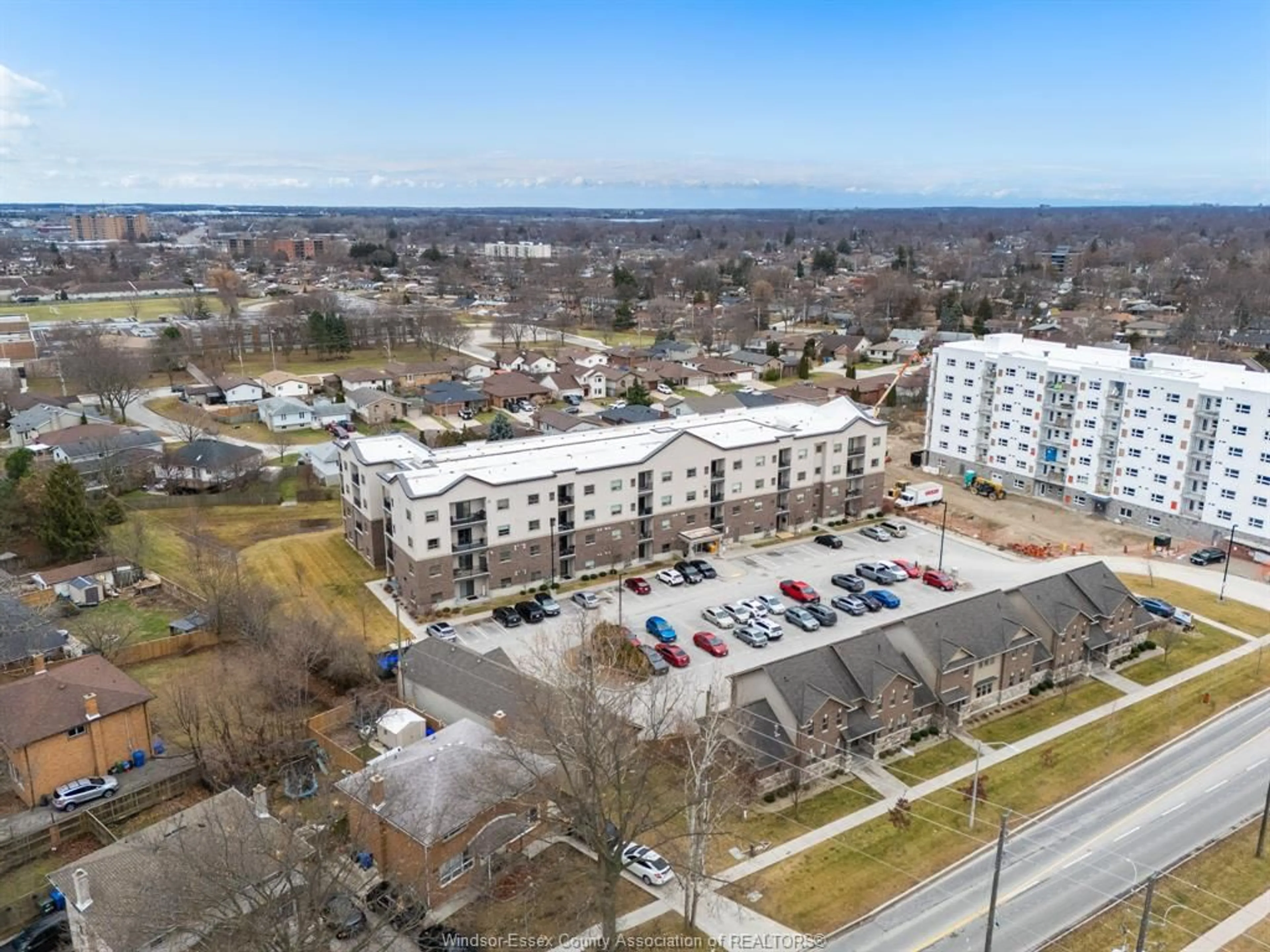 A pic from outside/outdoor area/front of a property/back of a property/a pic from drone, city buildings view from balcony for 8475 Wyandotte St #111, Windsor Ontario N8S 0A4