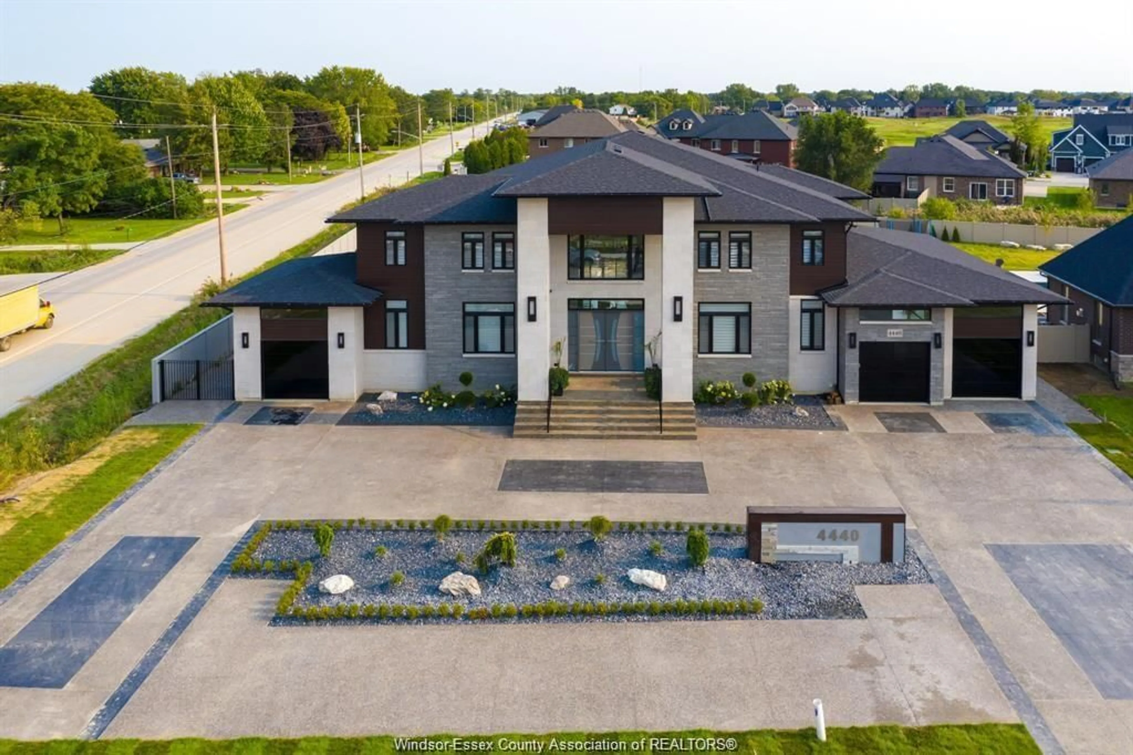 A pic from outside/outdoor area/front of a property/back of a property/a pic from drone, street for 4440 DONATO Dr, LaSalle Ontario N9H 0L5