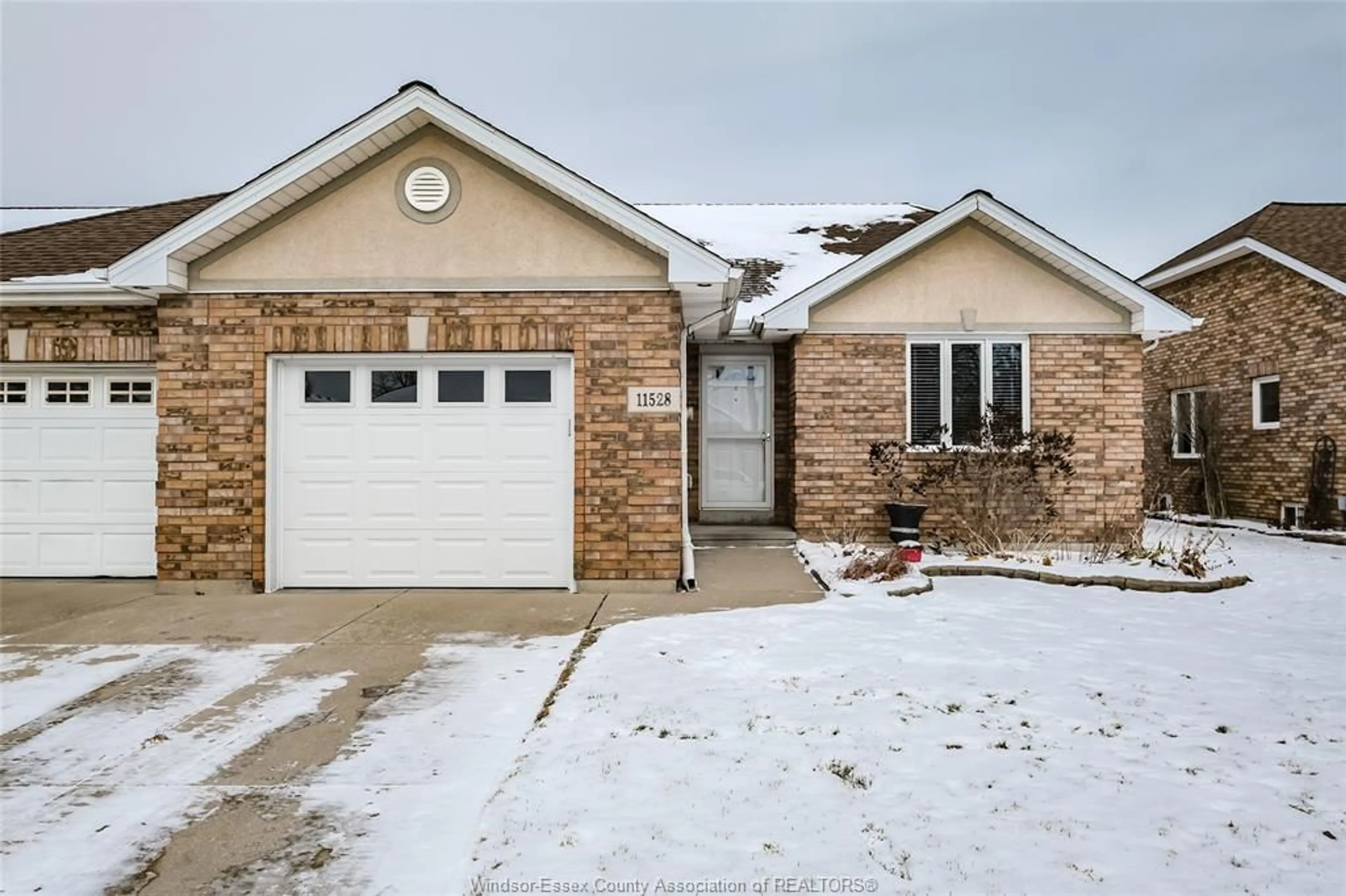 Home with brick exterior material, street for 11528 FIRGROVE Dr, Windsor Ontario N8P 1L9