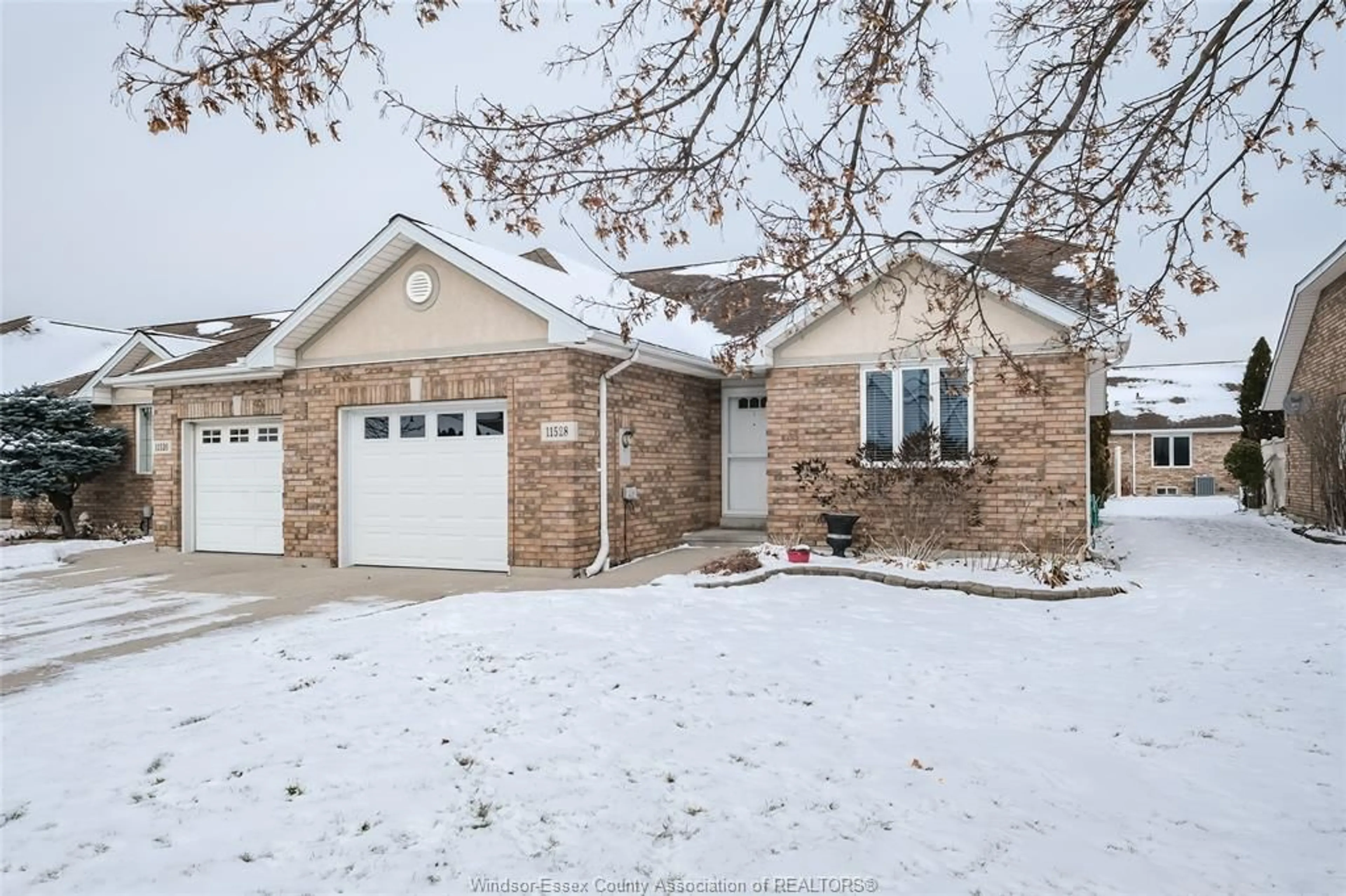 Home with brick exterior material, street for 11528 FIRGROVE Dr, Windsor Ontario N8P 1L9