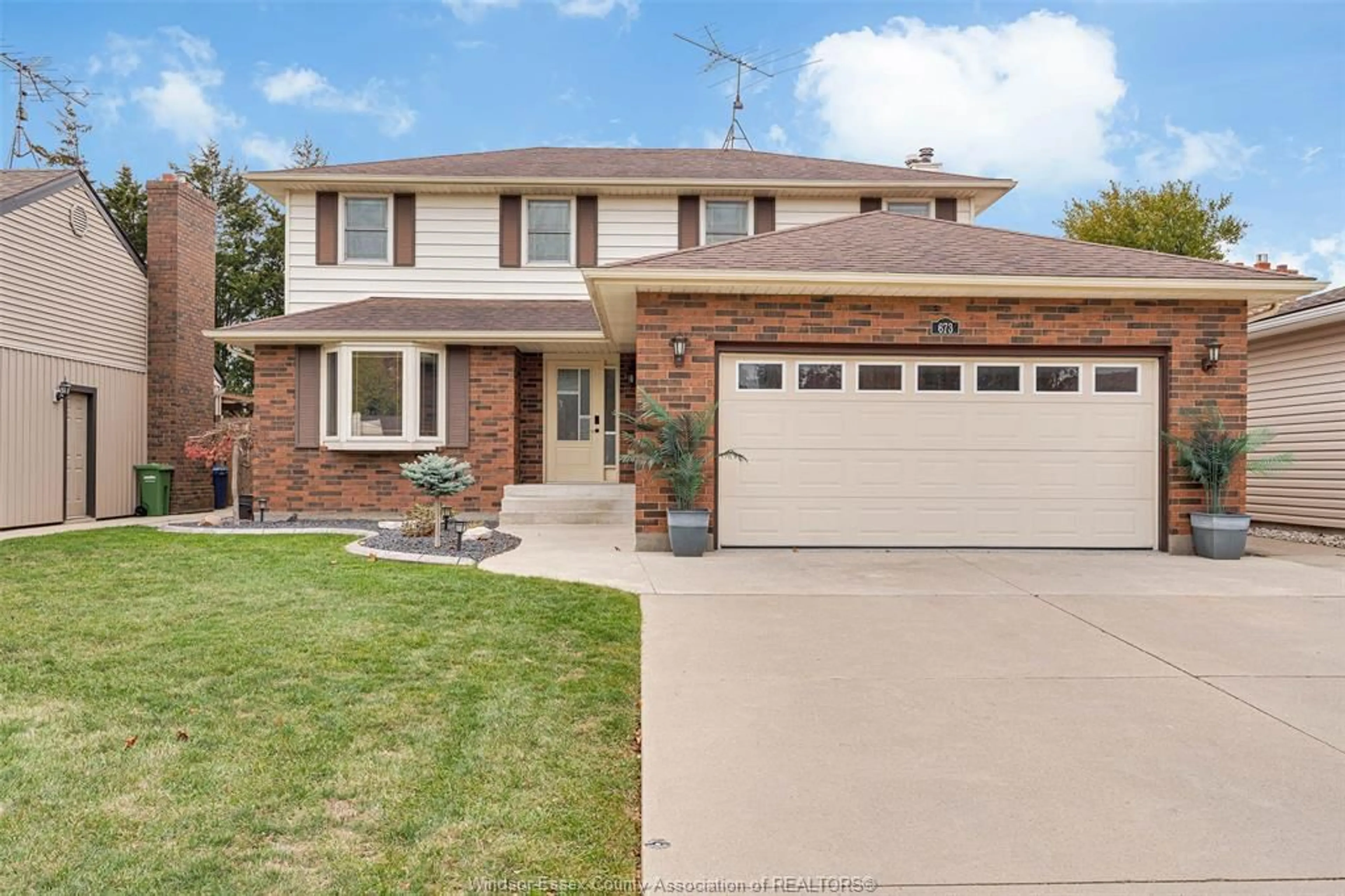 Home with brick exterior material, street for 673 Gauthier, Tecumseh Ontario N8N 3P7