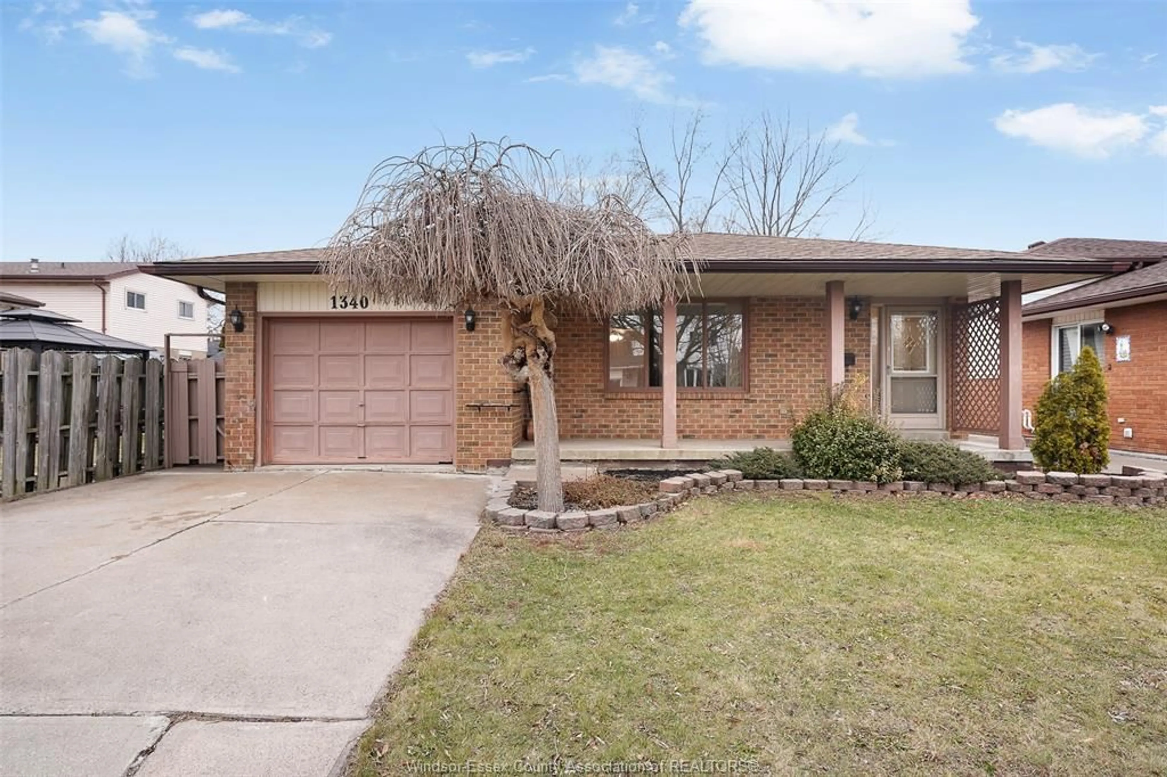 Home with brick exterior material, street for 1340 AZALIA Cres, Windsor Ontario N8W 5C8
