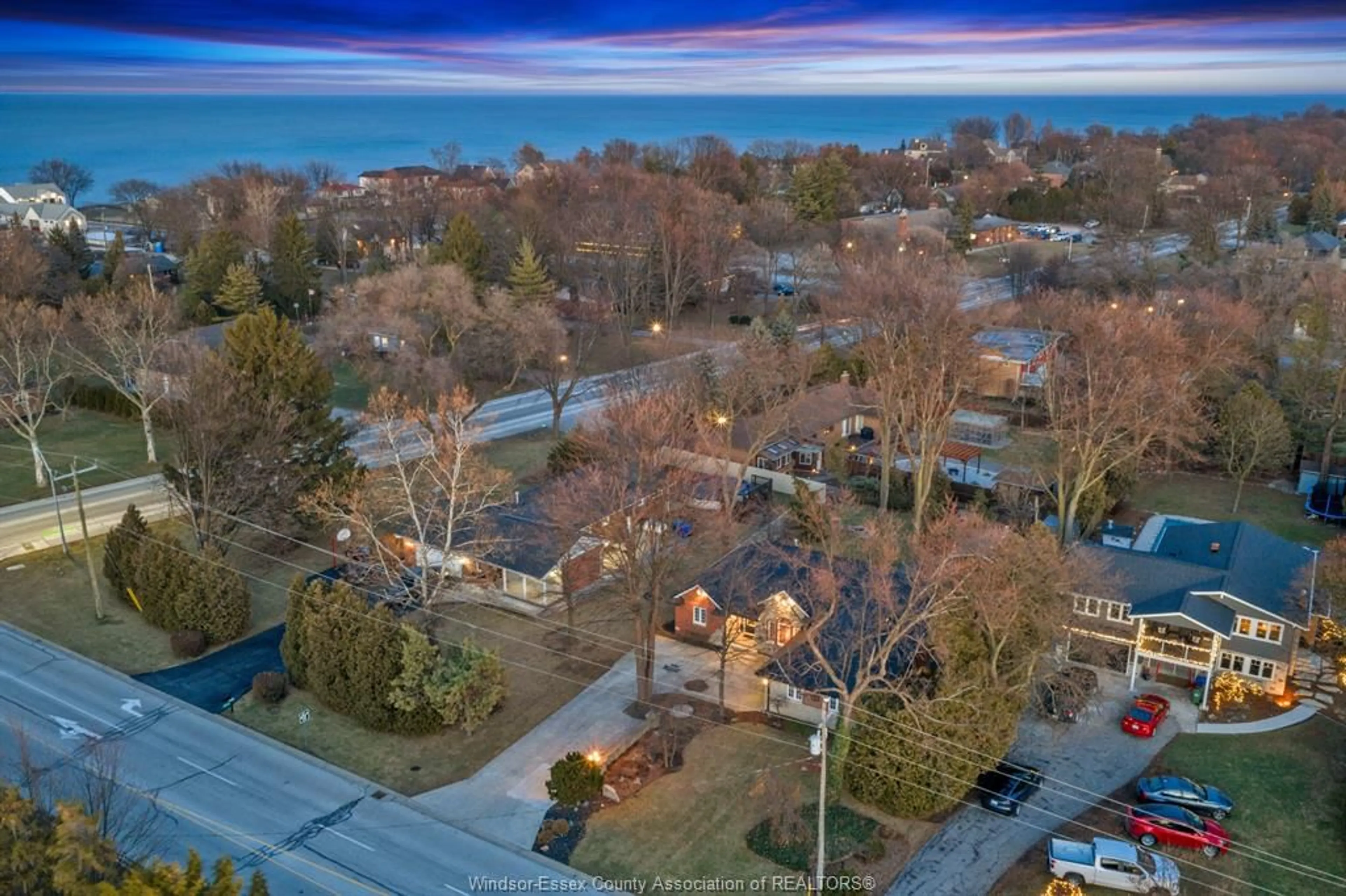 A pic from outside/outdoor area/front of a property/back of a property/a pic from drone, water/lake/river/ocean view for 106 Patillo, Lakeshore Ontario N8N 4X9