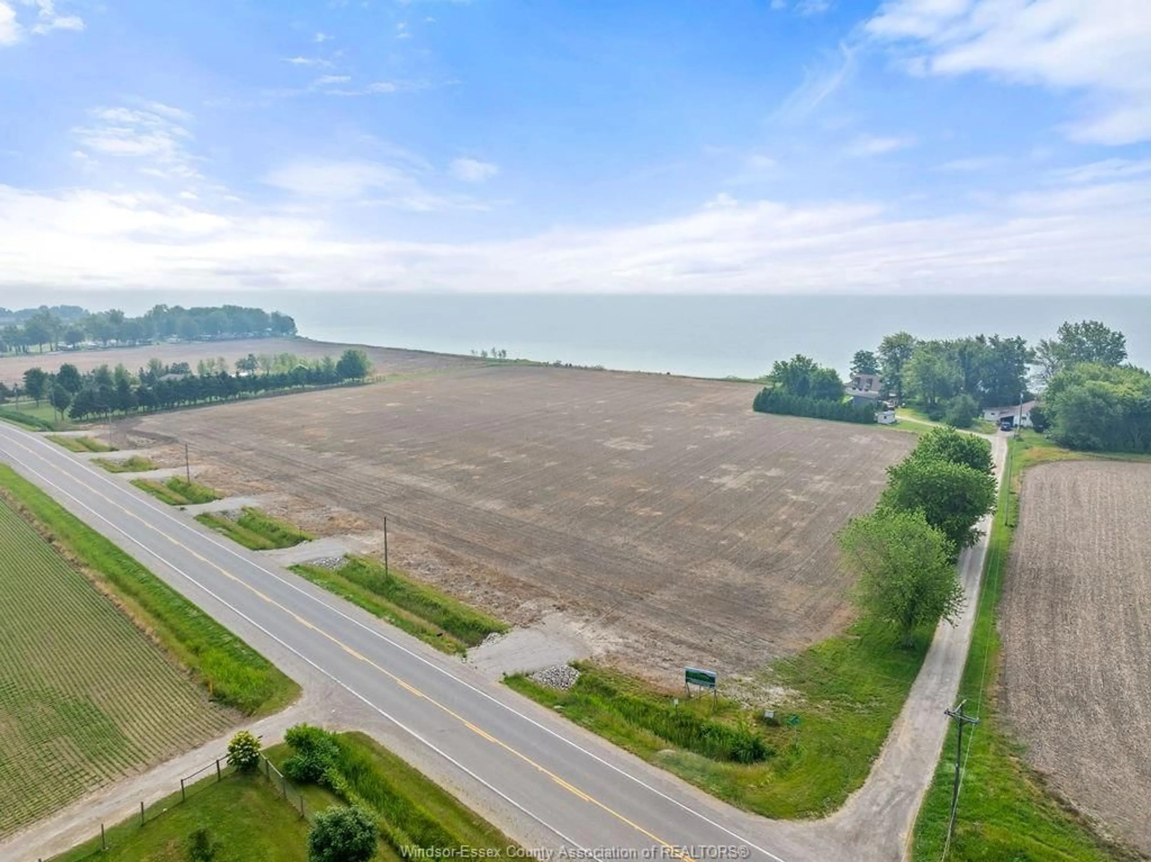 A pic from outside/outdoor area/front of a property/back of a property/a pic from drone, water/lake/river/ocean view for 2320 CEDAR Rd, Wheatley Ontario N0P 2P0