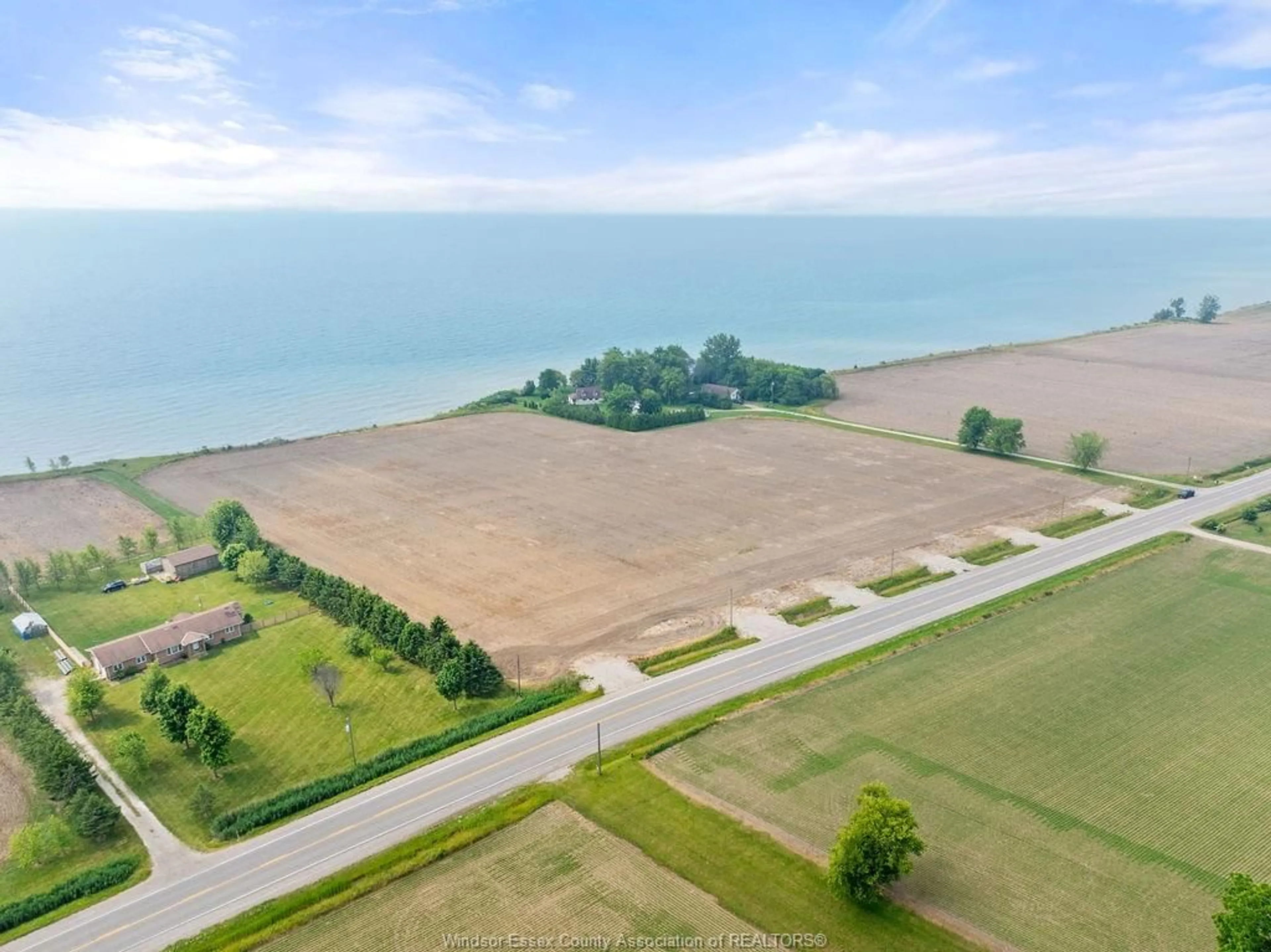 A pic from outside/outdoor area/front of a property/back of a property/a pic from drone, water/lake/river/ocean view for 2320 CEDAR Rd, Wheatley Ontario N0P 2P0