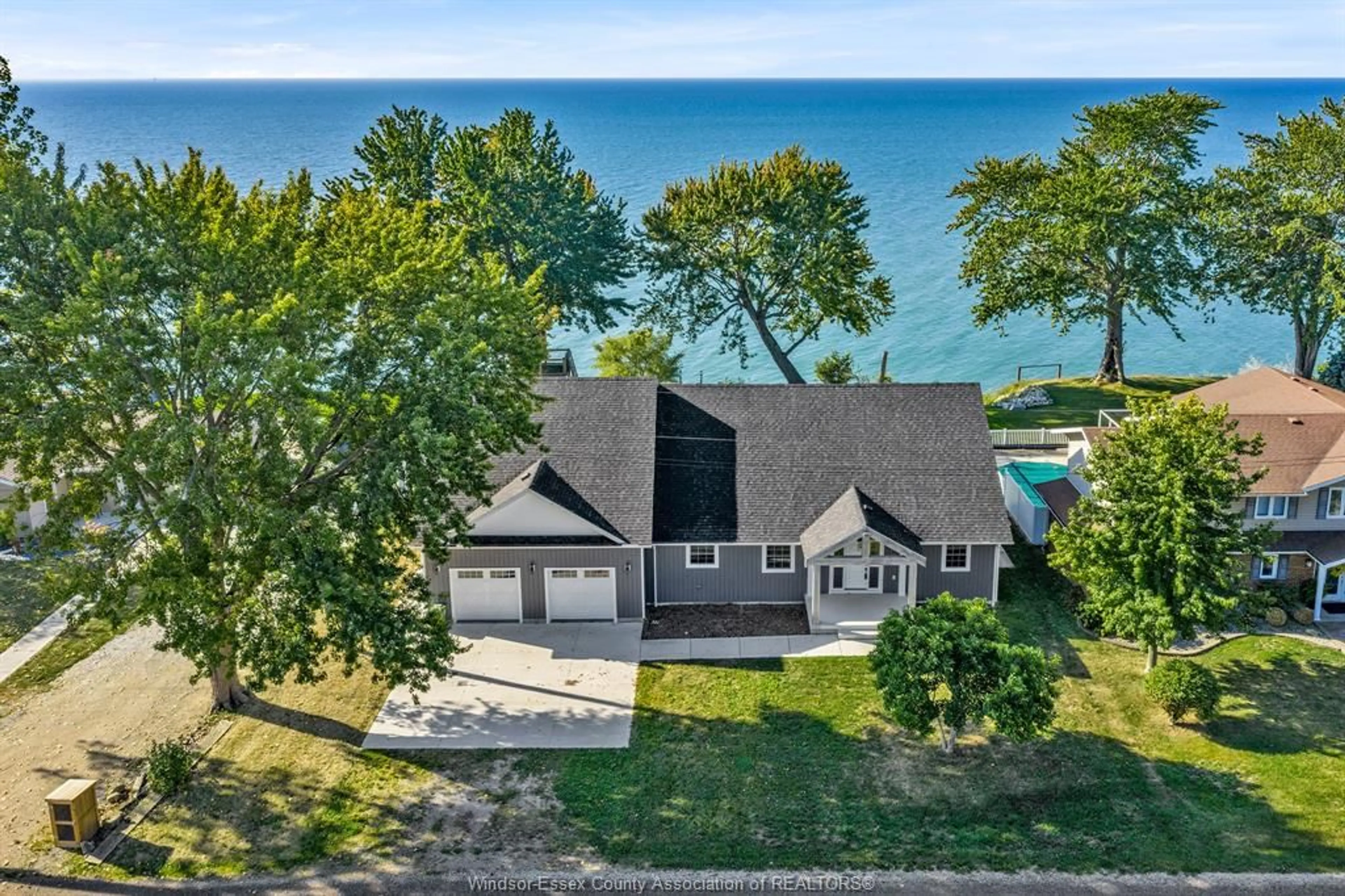 A pic from outside/outdoor area/front of a property/back of a property/a pic from drone, water/lake/river/ocean view for 131 HOWE Rd, Colchester South Ontario N0R 1G0
