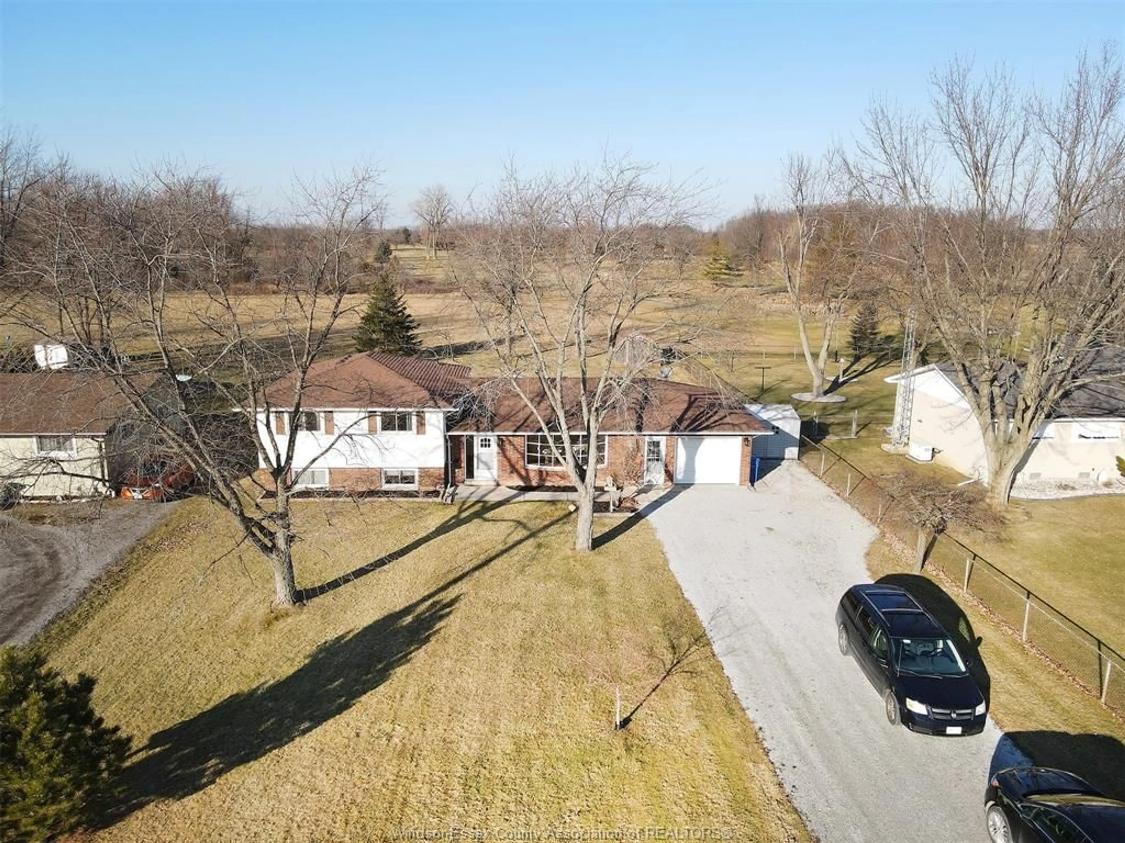 A pic from outside/outdoor area/front of a property/back of a property/a pic from drone, street for 263 Road 11, Kingsville Ontario N0R 1V0
