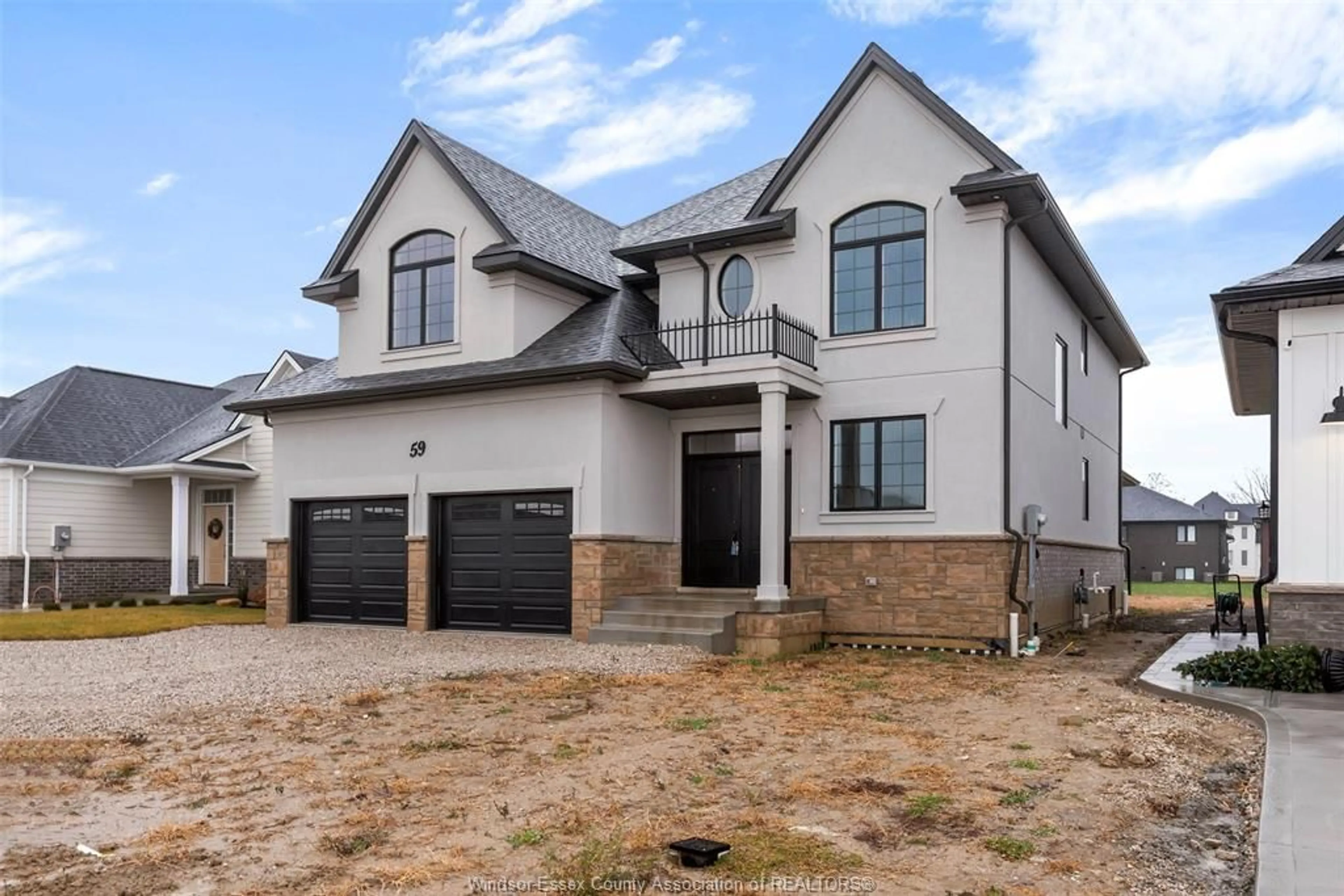 Home with brick exterior material, street for 59 BELLEVIEW Dr, Kingsville Ontario N0R 1B0