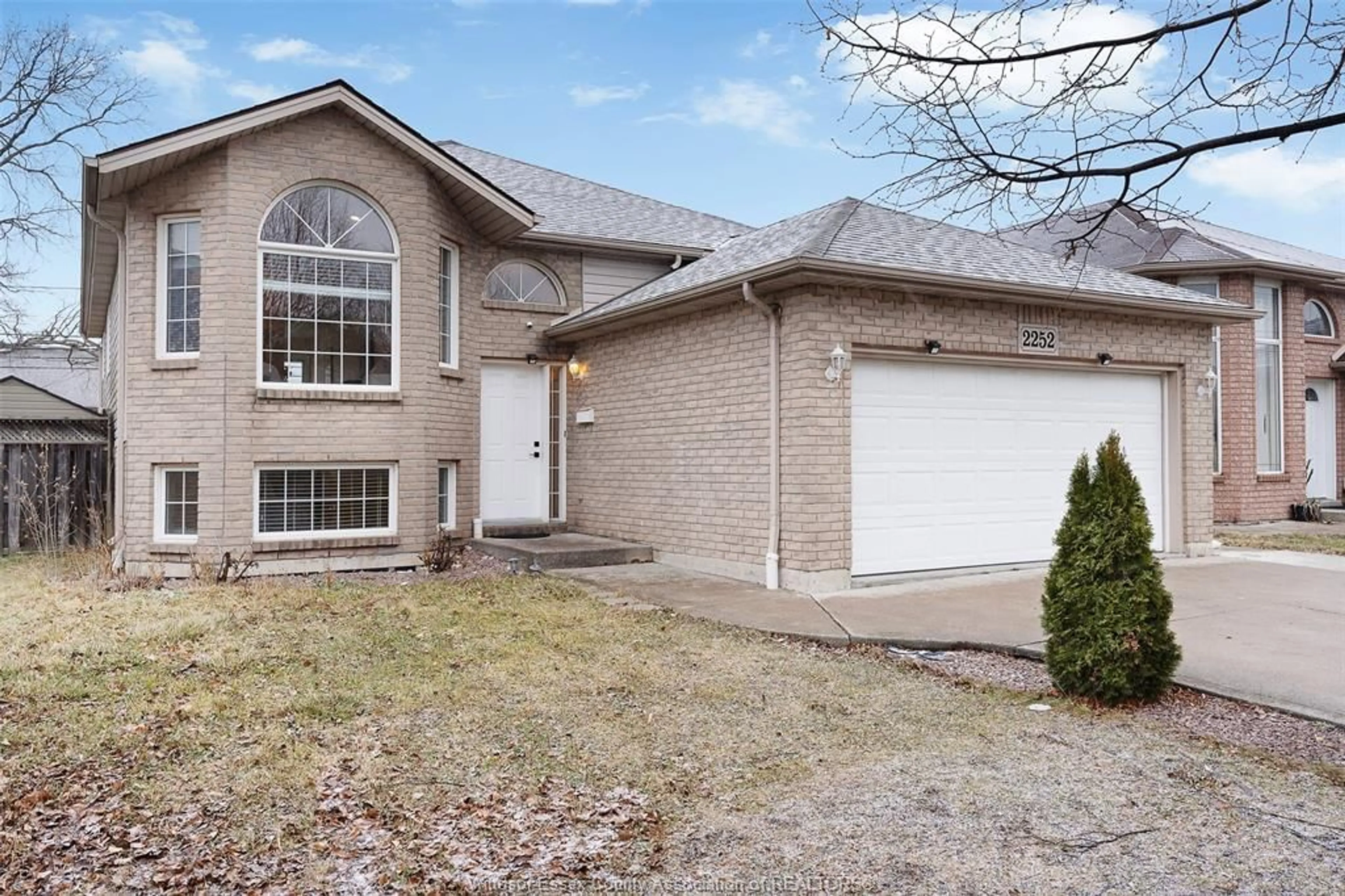 Home with brick exterior material, street for 2252 MCKAY Ave, Windsor Ontario N9B 3W9