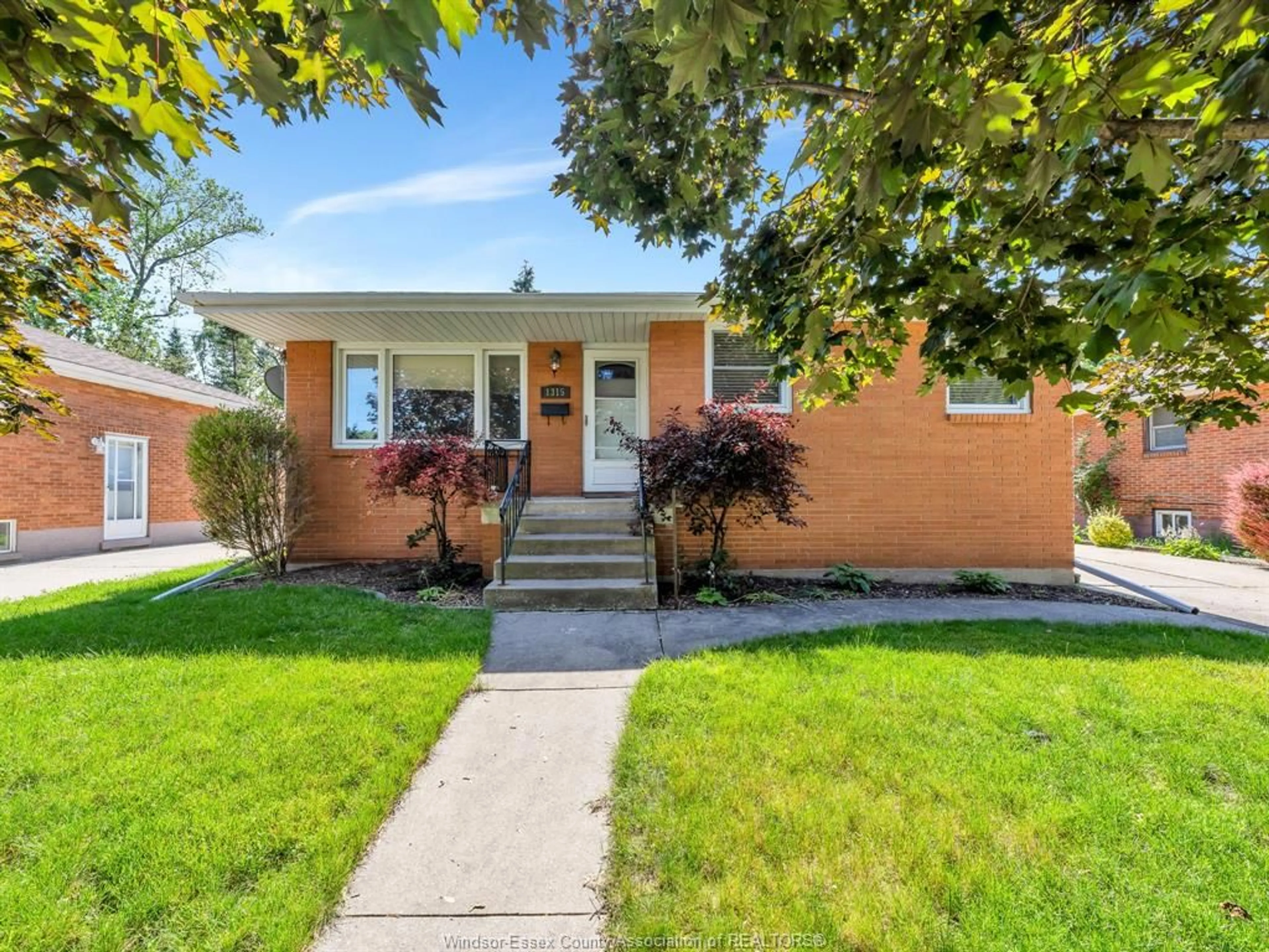 Home with brick exterior material, street for 1315 JANETTE Ave, Windsor Ontario N8X 1Y7