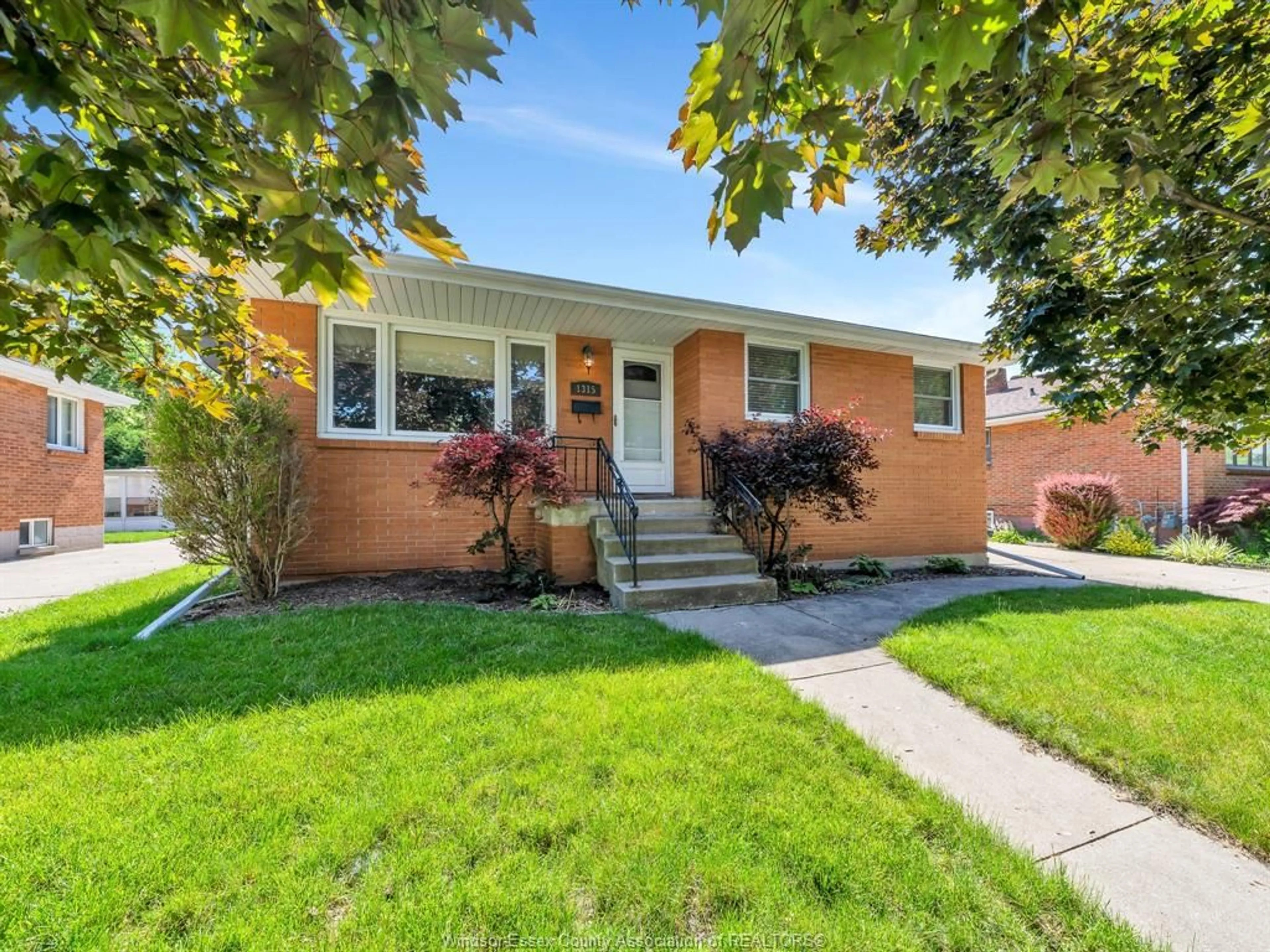 Home with brick exterior material, street for 1315 JANETTE Ave, Windsor Ontario N8X 1Y7