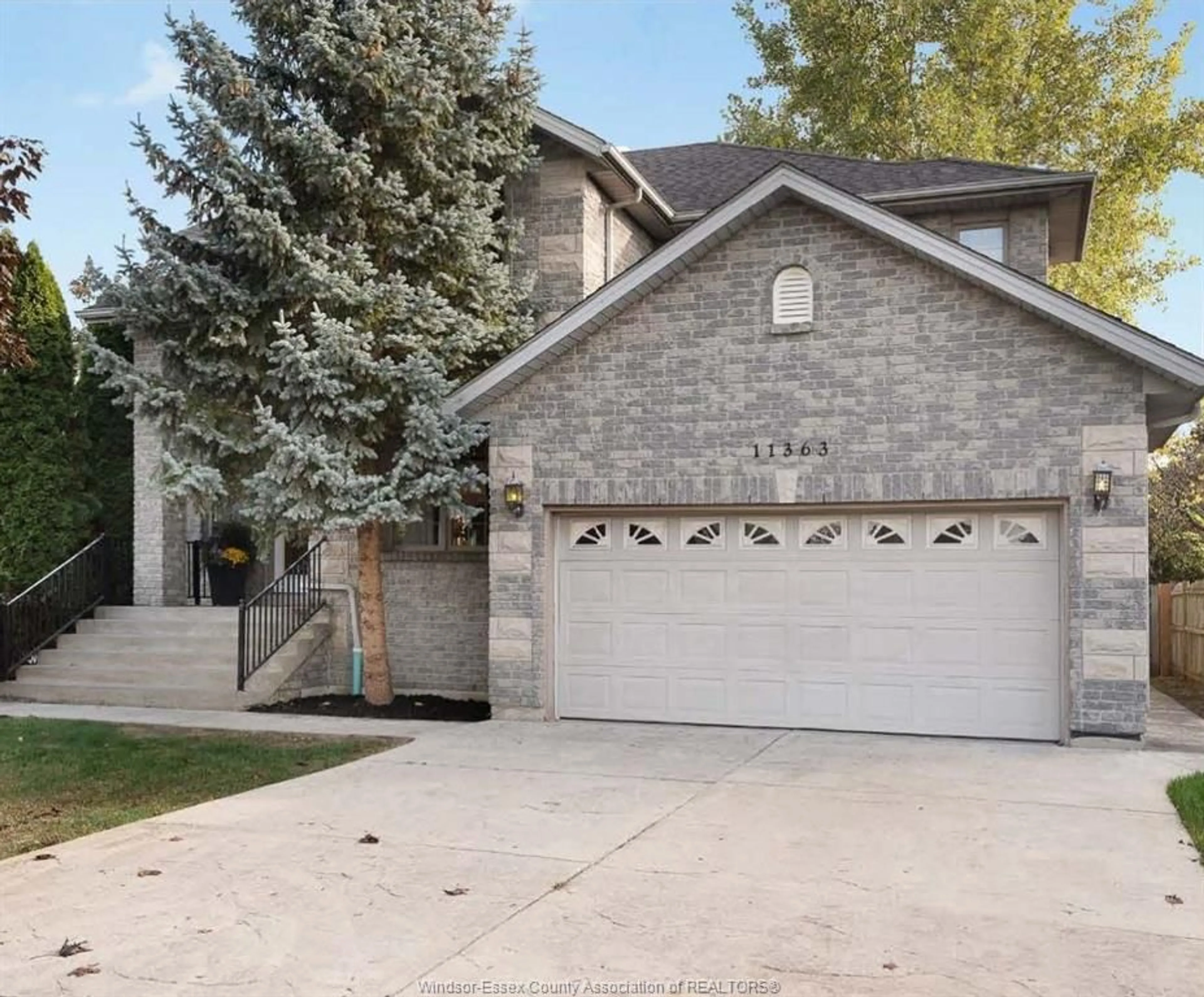 Home with brick exterior material, street for 11363 AMALFI Dr, Windsor Ontario N8P 1J8