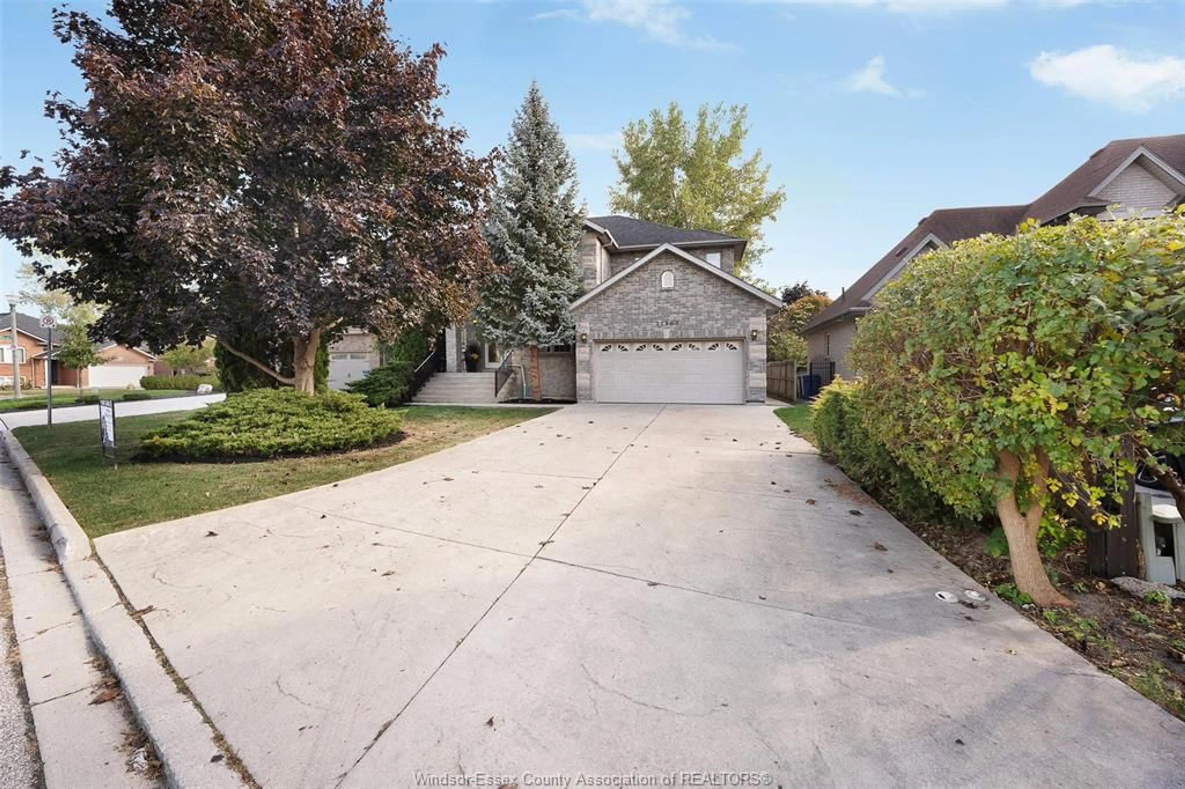 A pic from outside/outdoor area/front of a property/back of a property/a pic from drone, street for 11363 AMALFI Dr, Windsor Ontario N8P 1J8