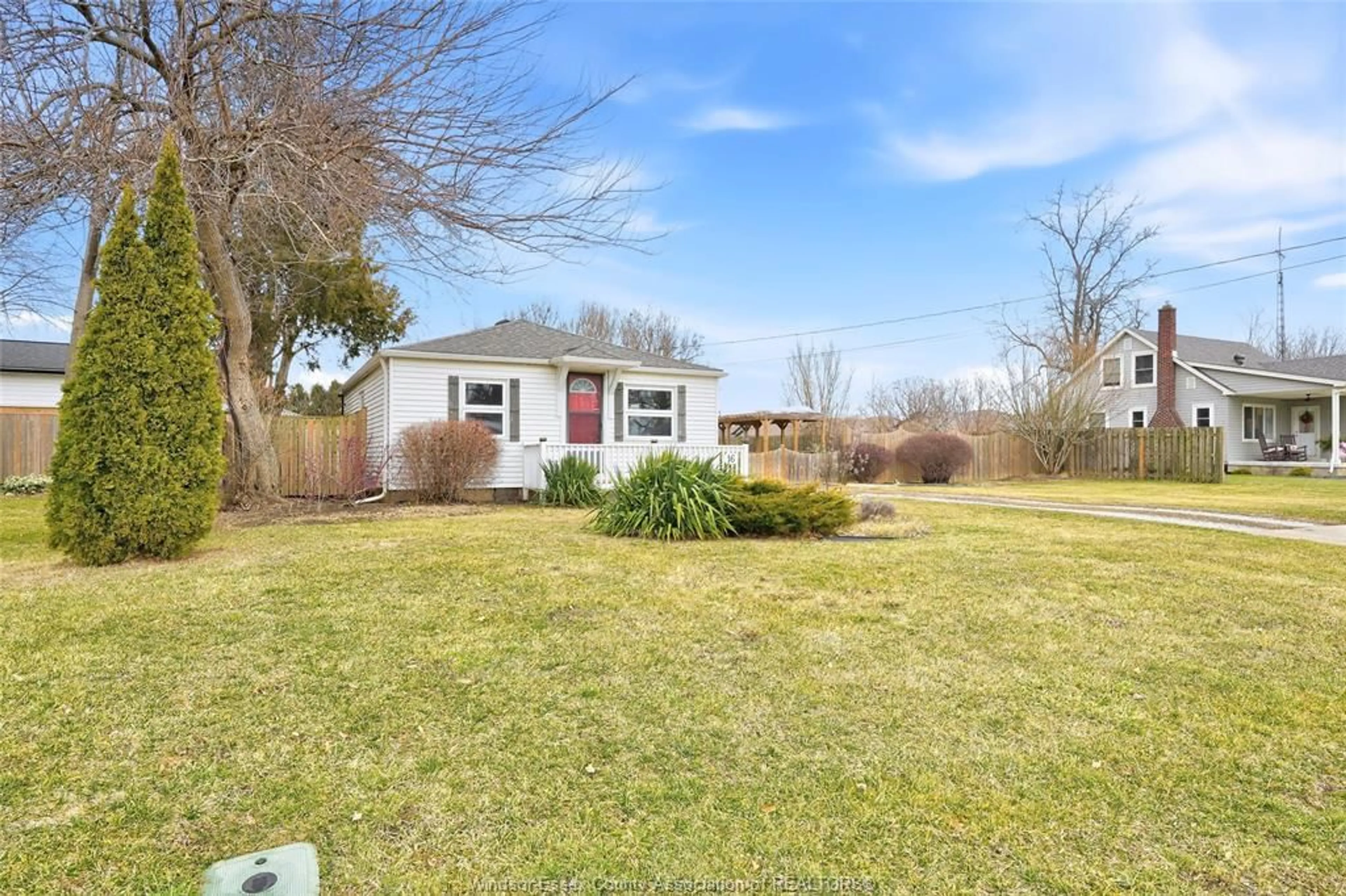 A pic from outside/outdoor area/front of a property/back of a property/a pic from drone, water/lake/river/ocean view for 16 MCCALLUM Ave, Kingsville Ontario N9Y 1C2