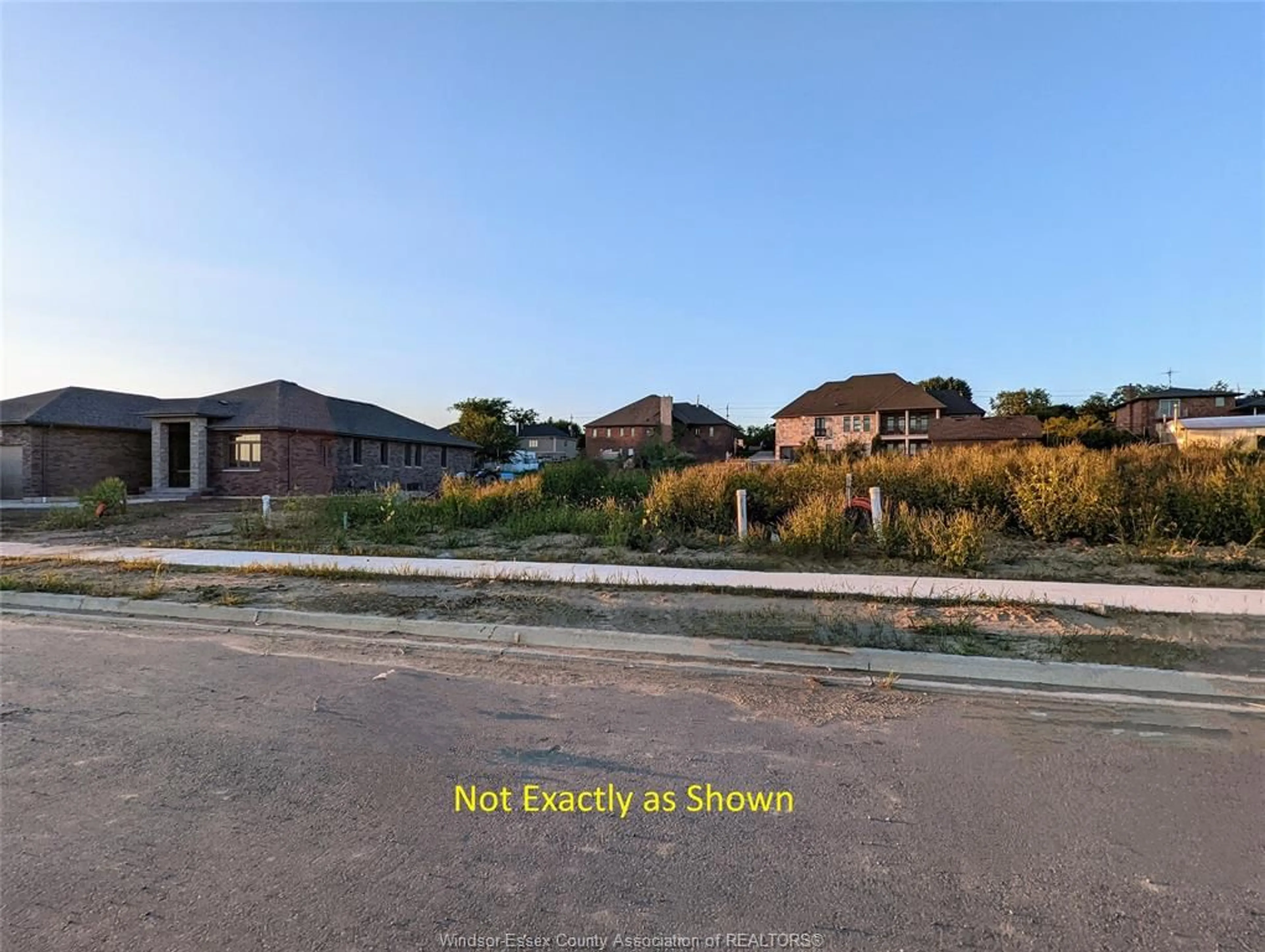A pic from outside/outdoor area/front of a property/back of a property/a pic from drone, street for 1924 SERENITY Lane, Kingsville Ontario A0A 0A0