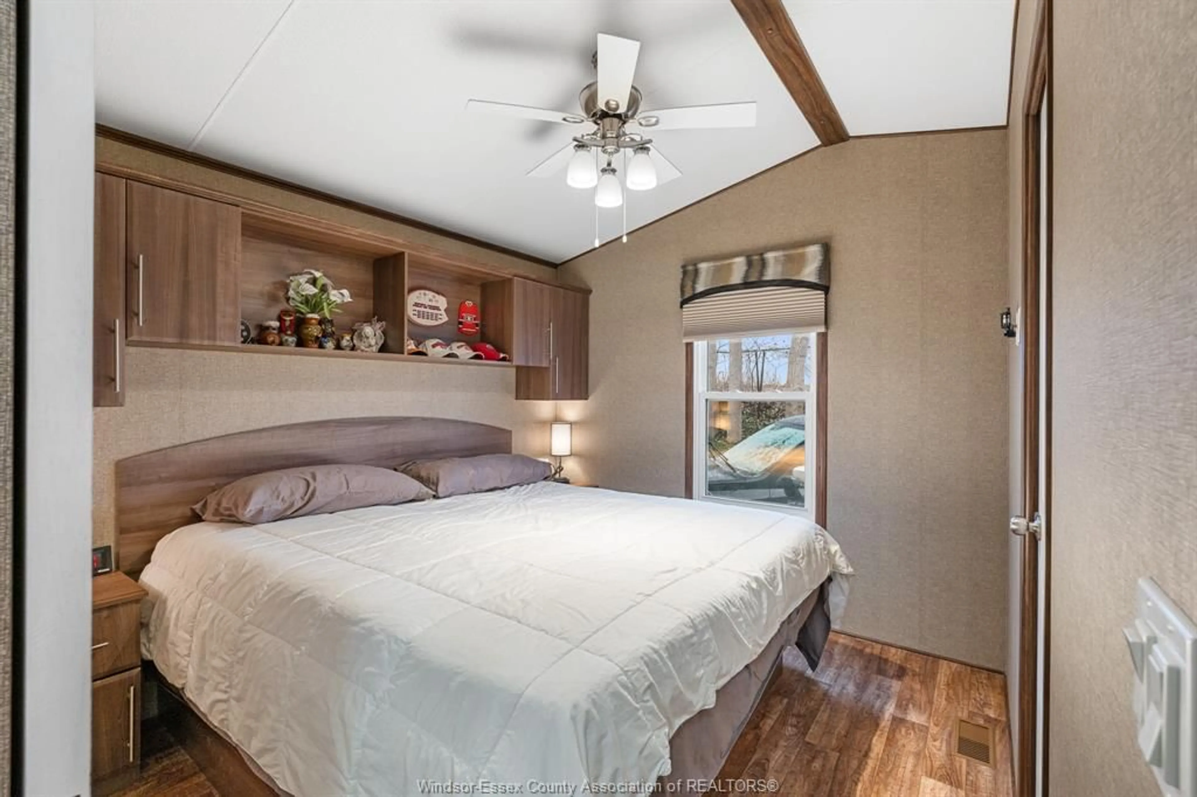 Bedroom with bed, wood/laminate floor for 126 Mersea Rd 5 (Lot #14), Leamington Ontario N8H 3V5