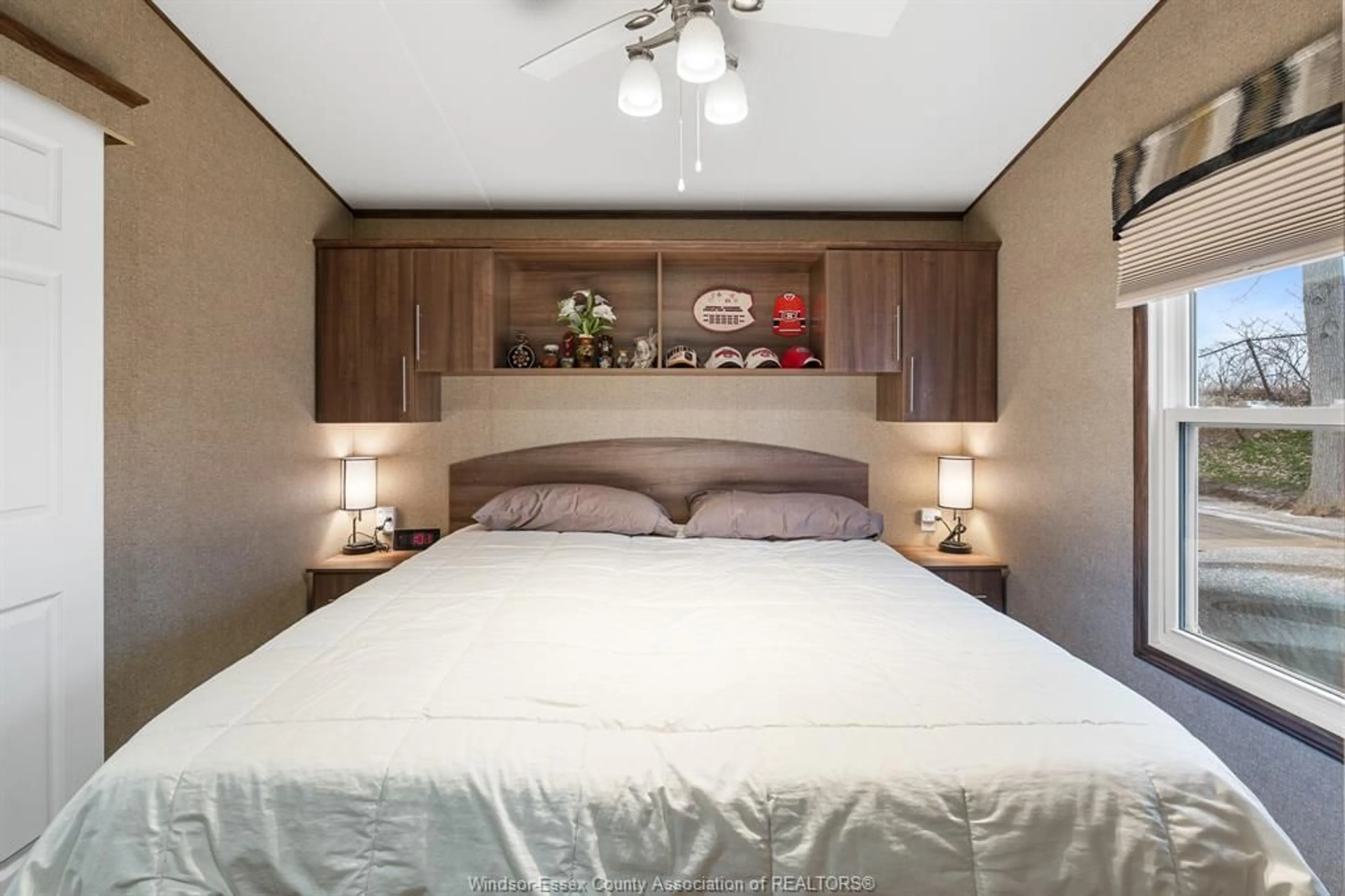 Bedroom with bed, wood/laminate floor for 126 Mersea Rd 5 (Lot #14), Leamington Ontario N8H 3V5