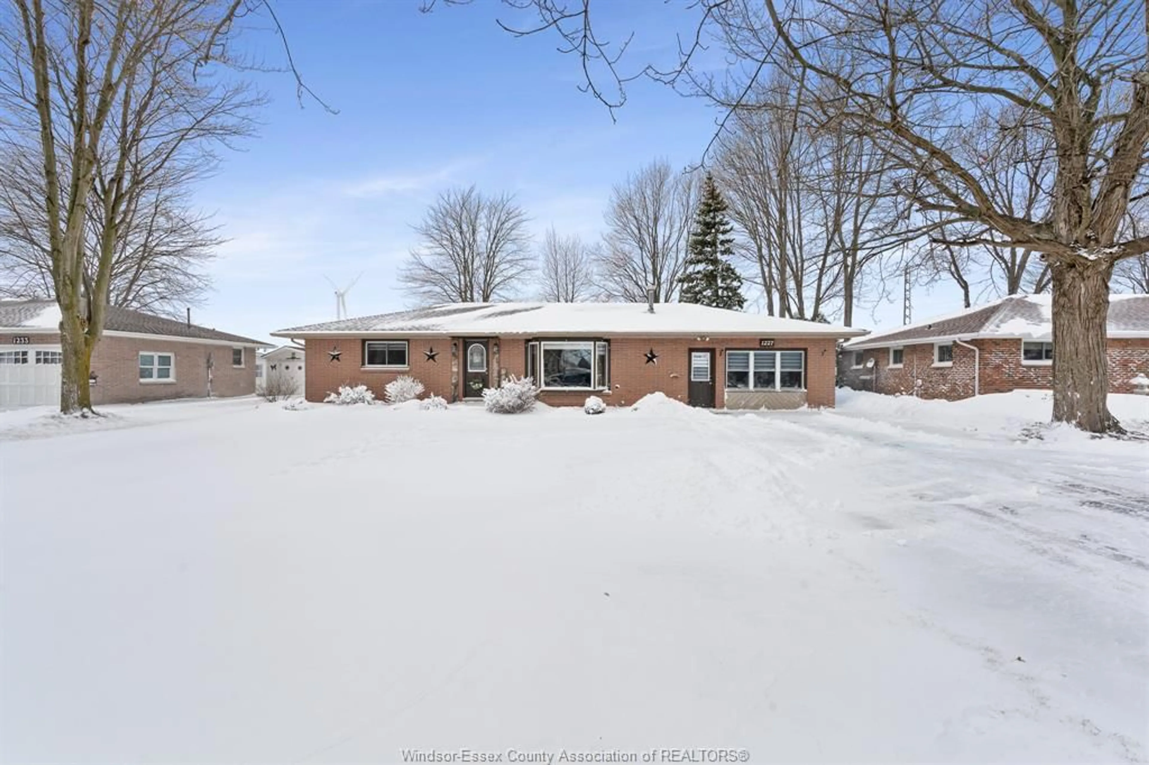 A pic from outside/outdoor area/front of a property/back of a property/a pic from drone, street for 1227 COUNTY RD 31, Lakeshore Ontario N0R 1S0