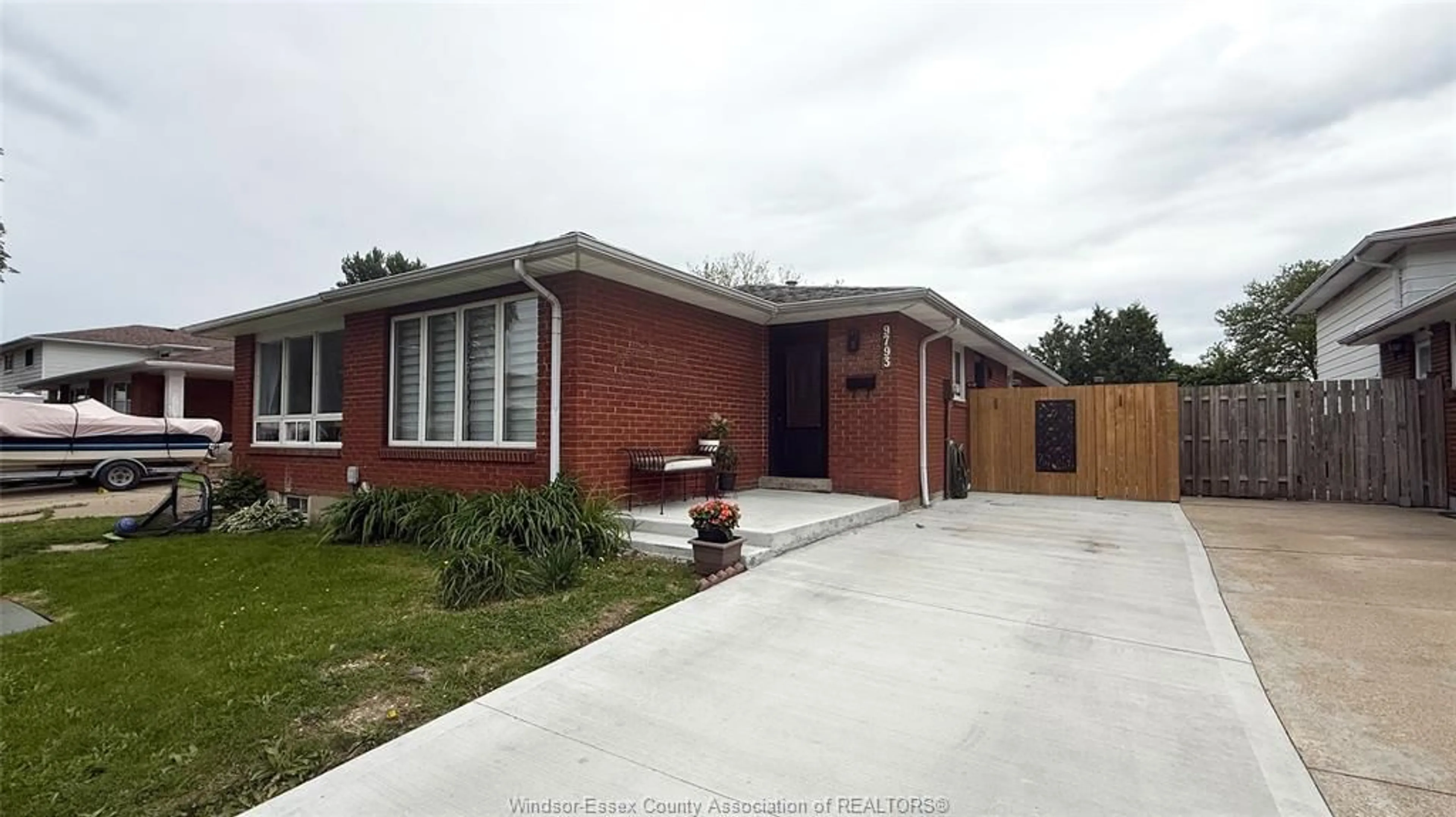 Home with brick exterior material, street for 9793 LYNNGROVE Cres, Windsor Ontario N8R 1B8