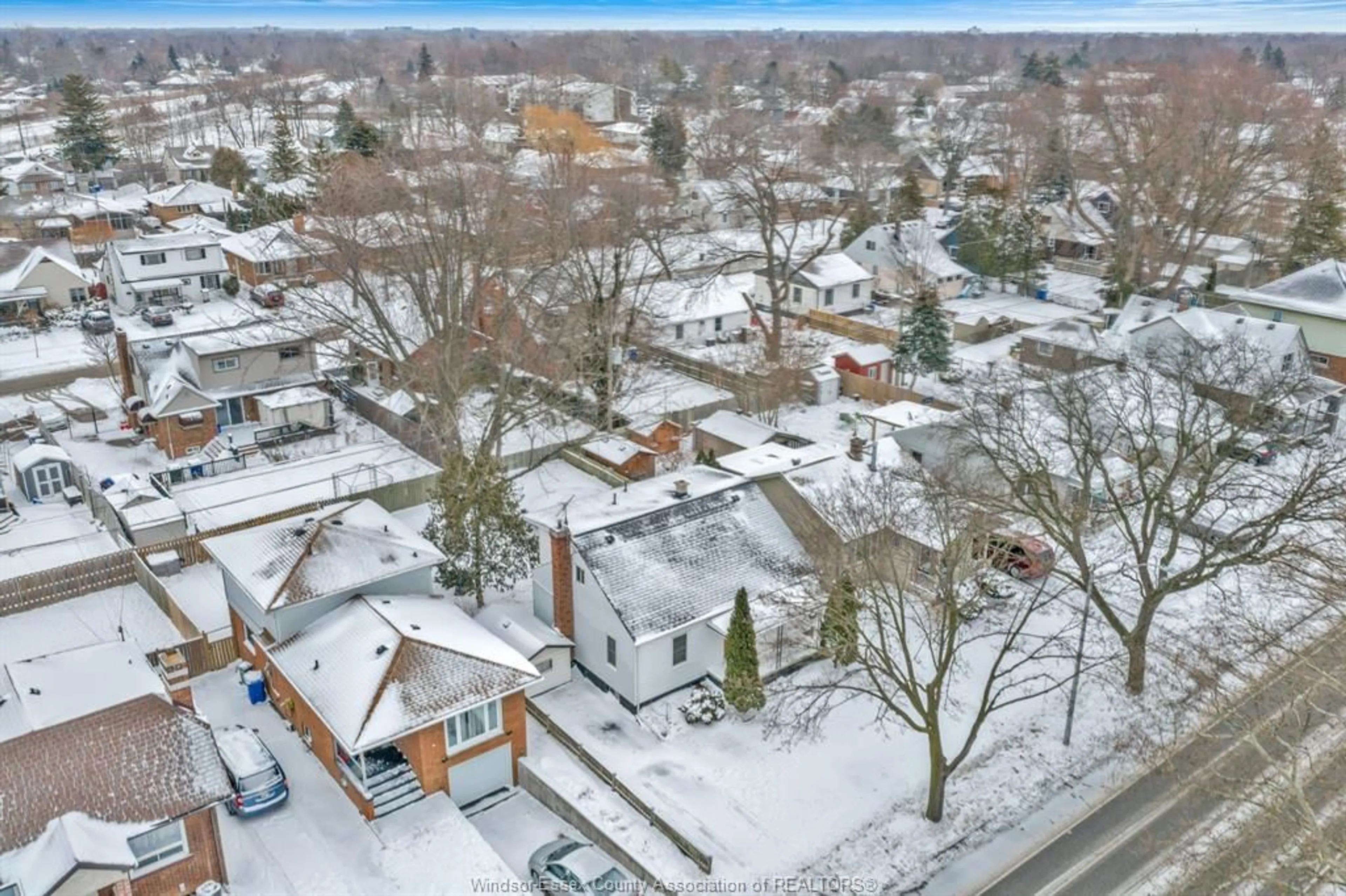 A pic from outside/outdoor area/front of a property/back of a property/a pic from drone, street for 1418 PILLETTE Rd, Windsor Ontario N8Y 3B9