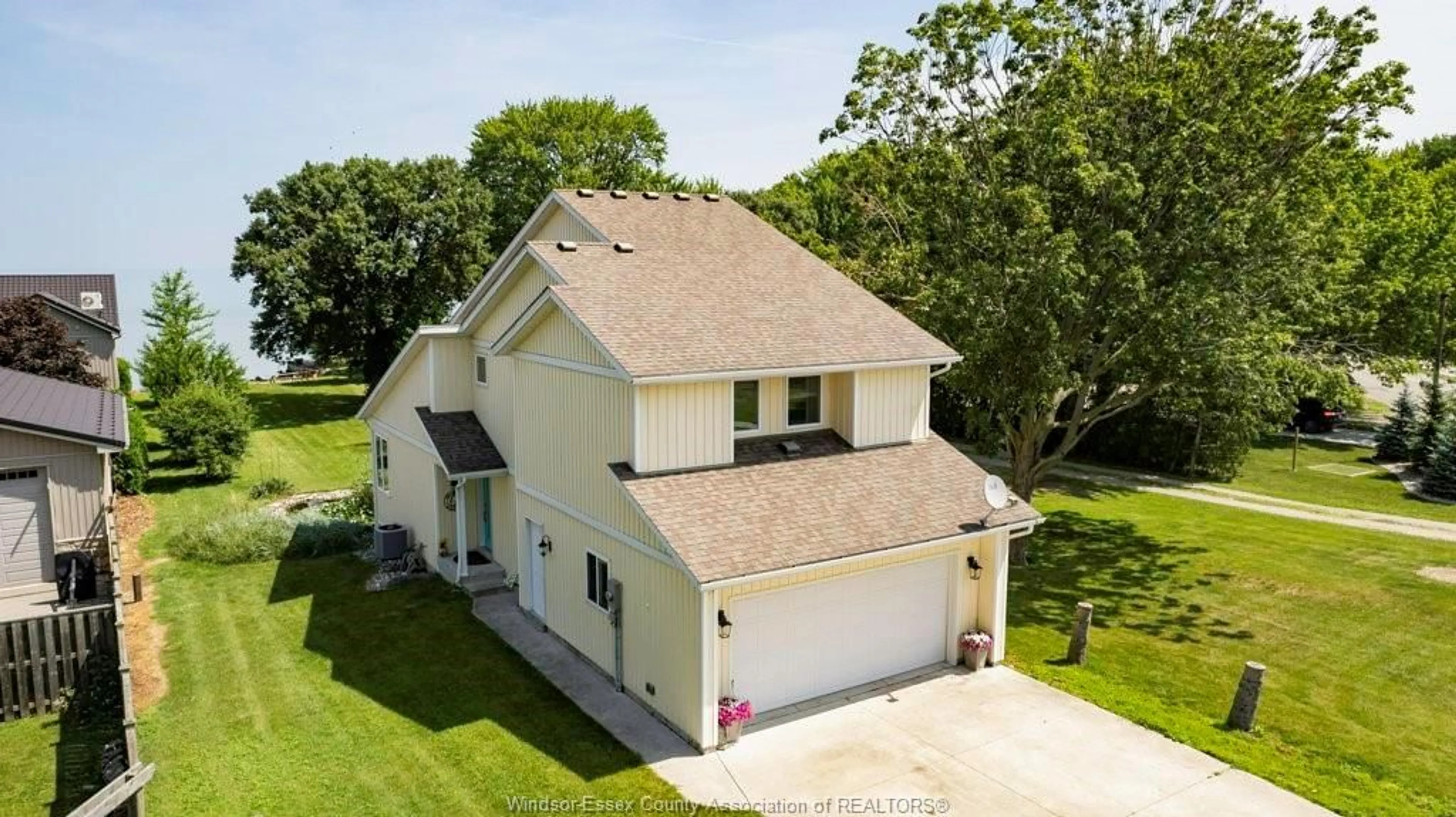 A pic from outside/outdoor area/front of a property/back of a property/a pic from drone, street for 1996 ST. CLAIR Rd, Stoney Point Ontario N0R 1N0