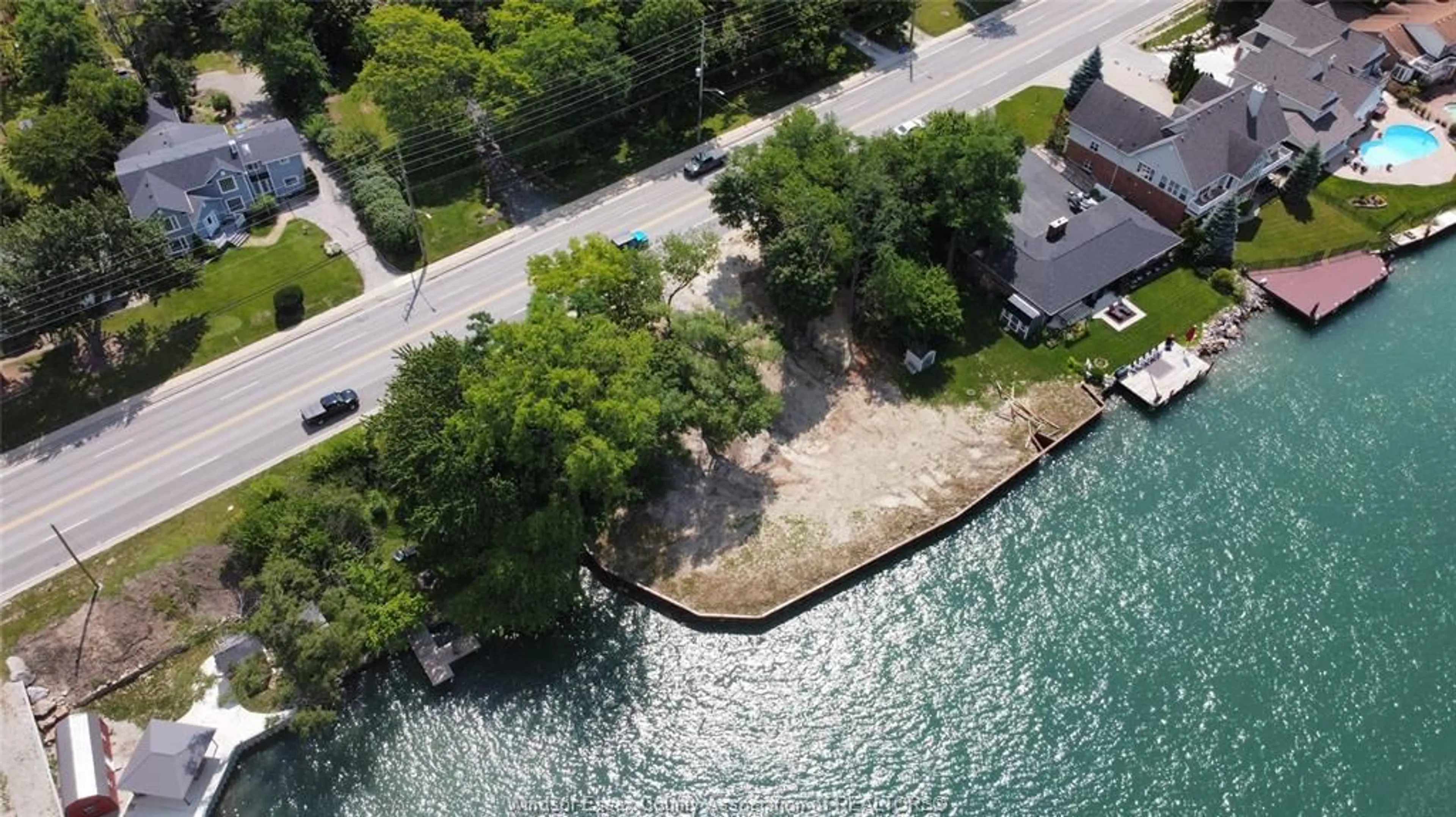 A pic from outside/outdoor area/front of a property/back of a property/a pic from drone, water/lake/river/ocean view for 560 FRONT Rd, Amherstburg Ontario N9V 2V7