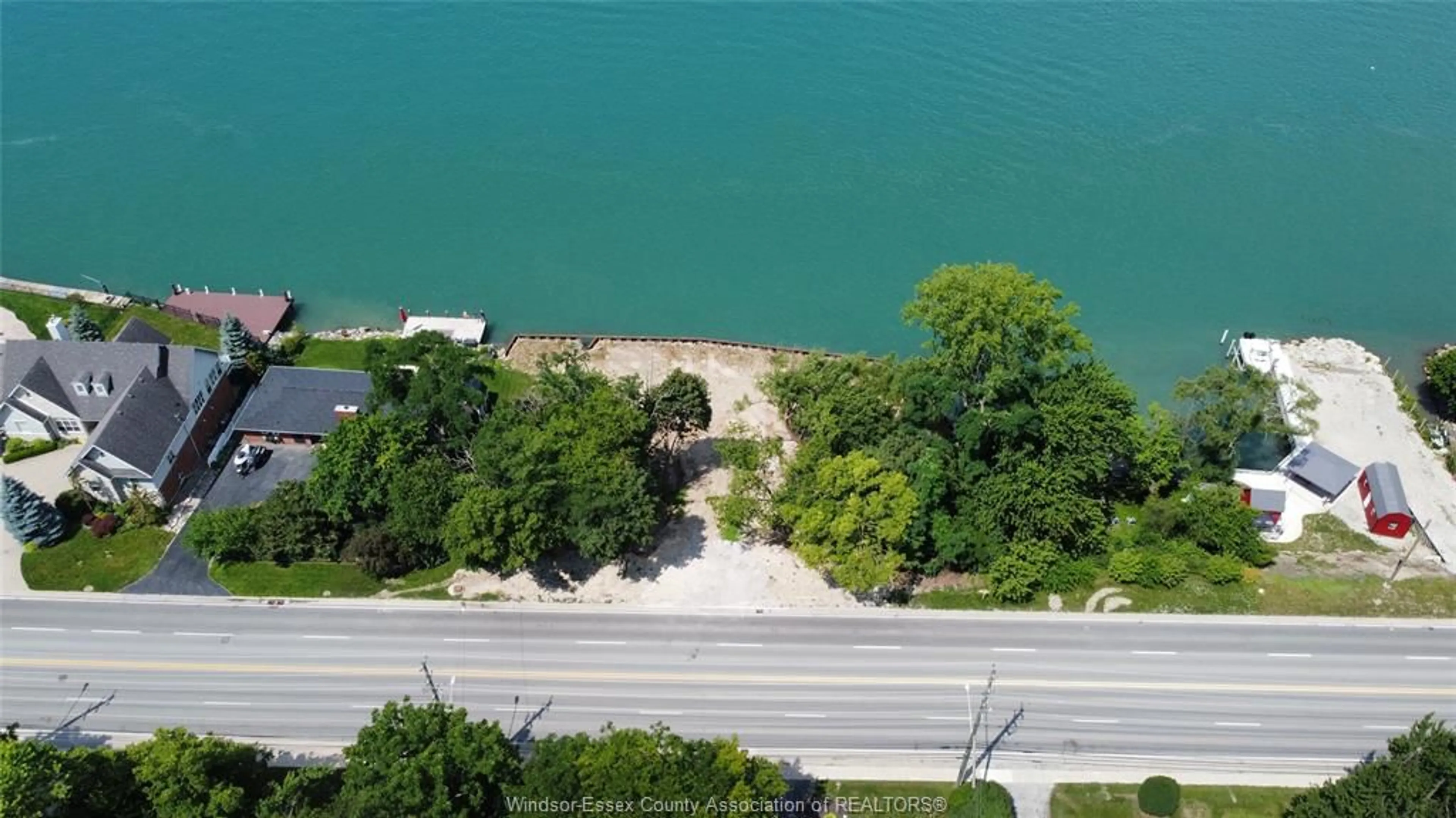 A pic from outside/outdoor area/front of a property/back of a property/a pic from drone, water/lake/river/ocean view for 560 FRONT Rd, Amherstburg Ontario N9V 2V7