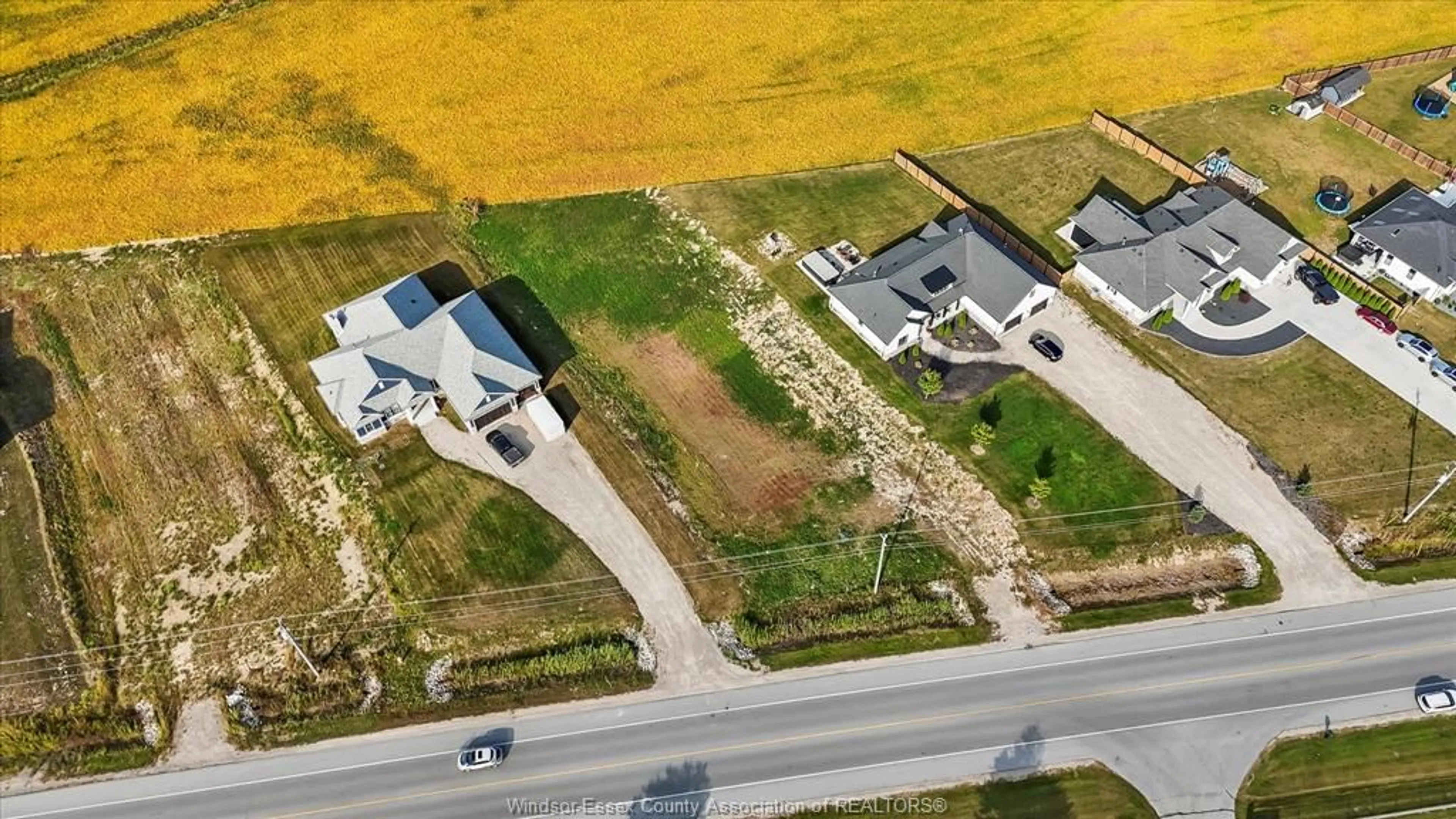 A pic from outside/outdoor area/front of a property/back of a property/a pic from drone, street for 5691 COUNTY RD 20, Amherstburg Ontario N9V 2Y8