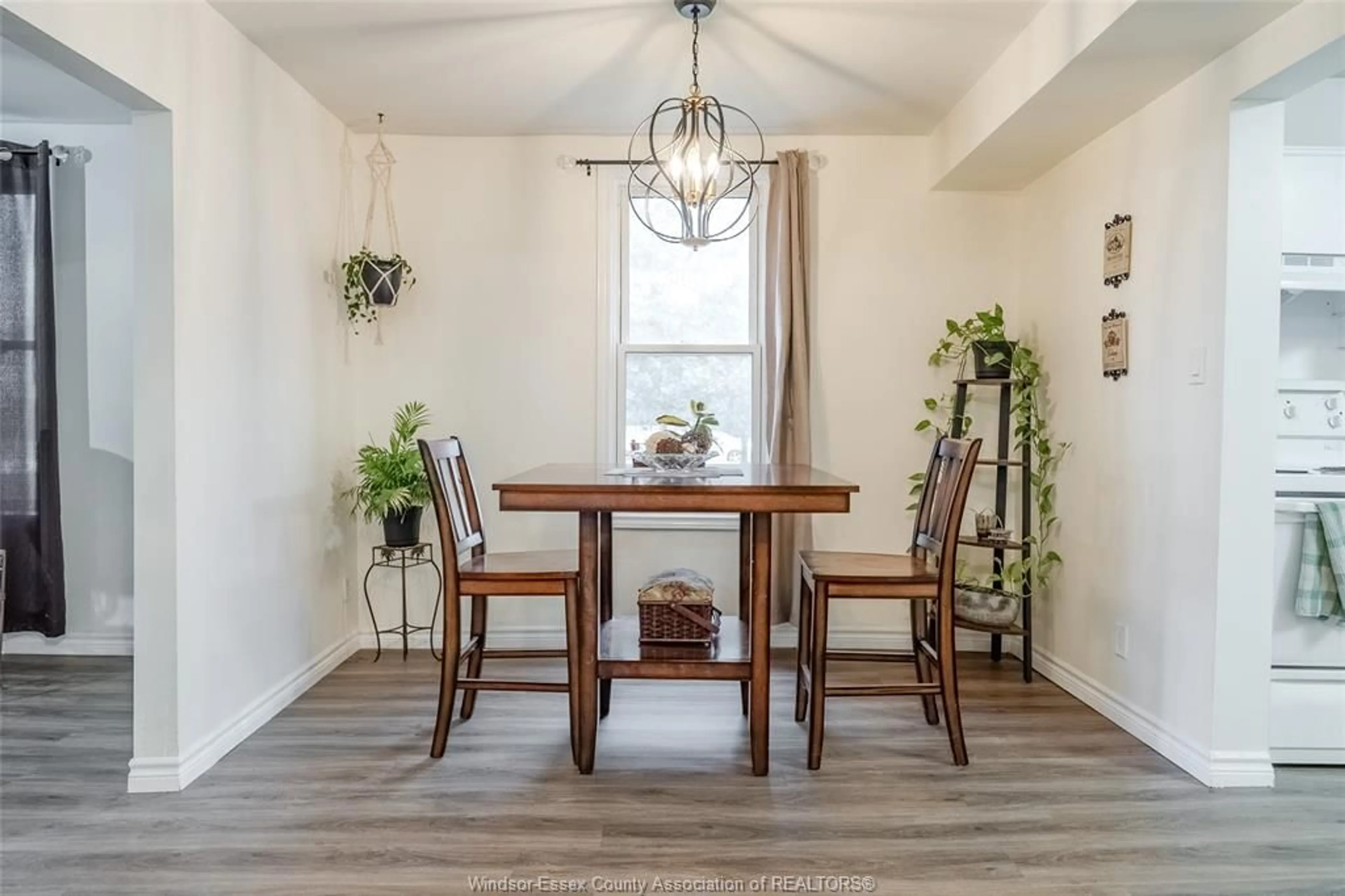 Dining room, wood/laminate floor for 2706 Front Rd, LaSalle Ontario N9J 2N5