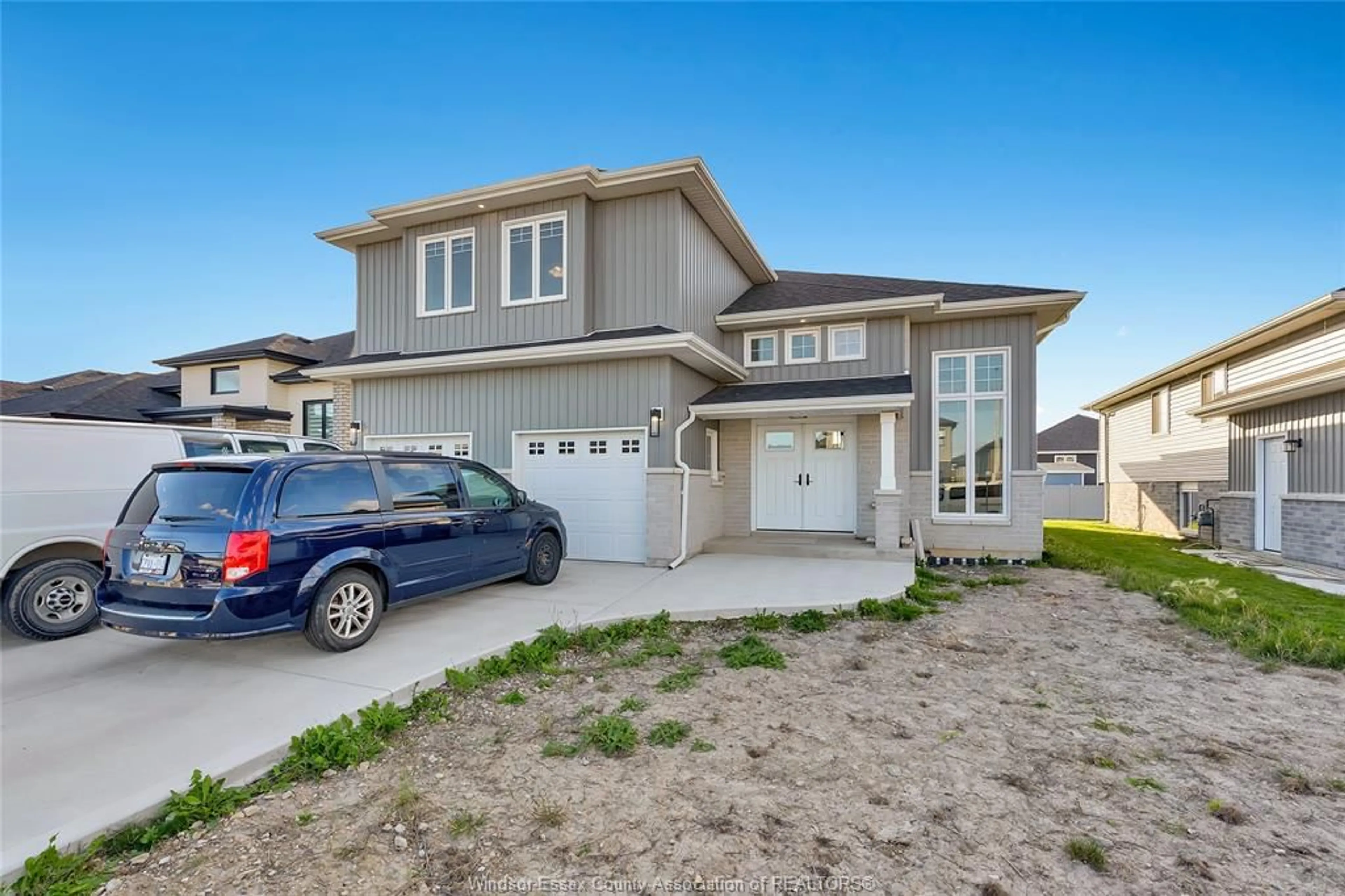 Home with vinyl exterior material, street for 305 MORIN Rd, Amherstburg Ontario N9V 4B5