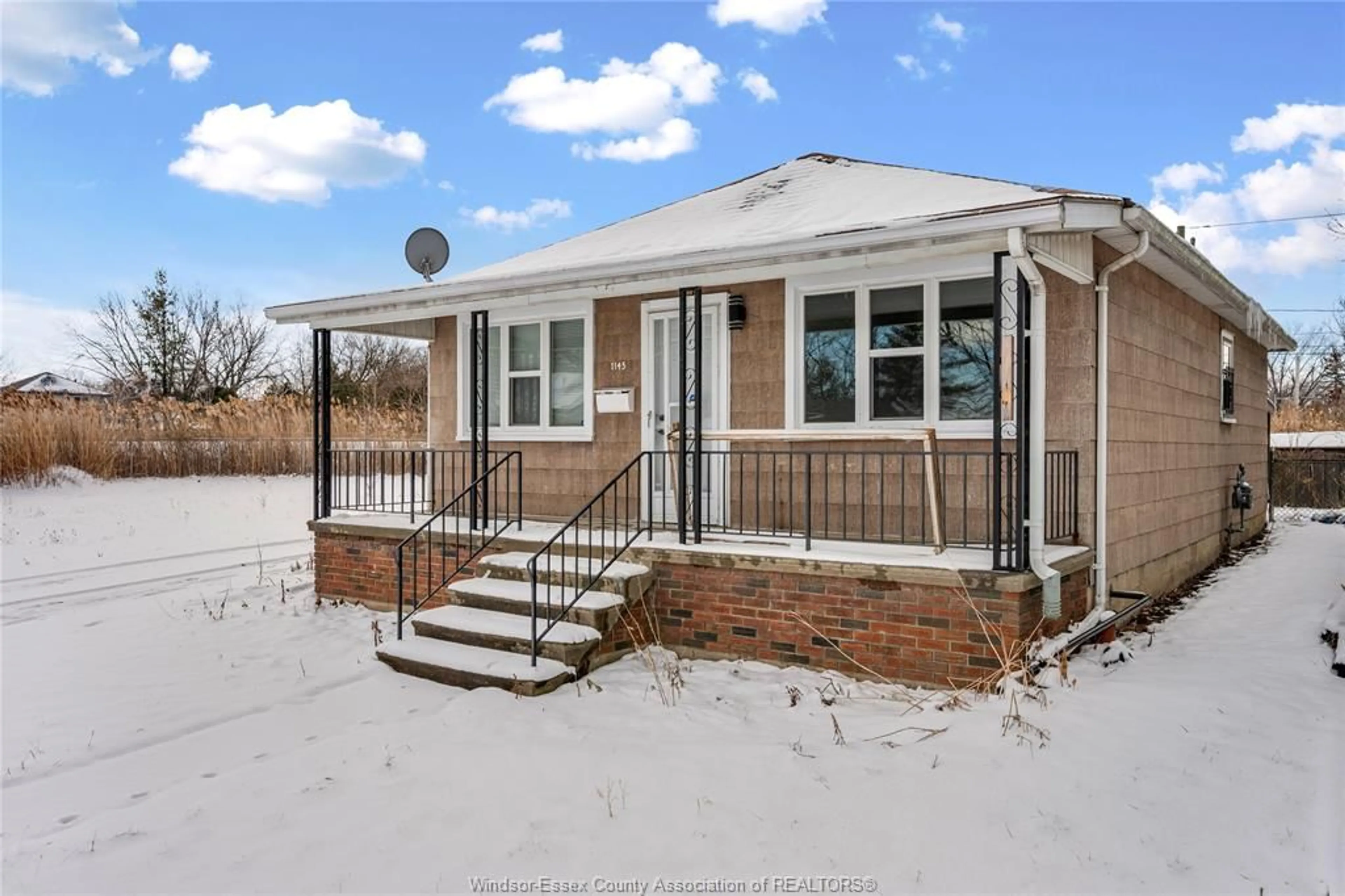 Home with brick exterior material, street for 1145 Ford Blvd, Windsor Ontario N8S 2G2